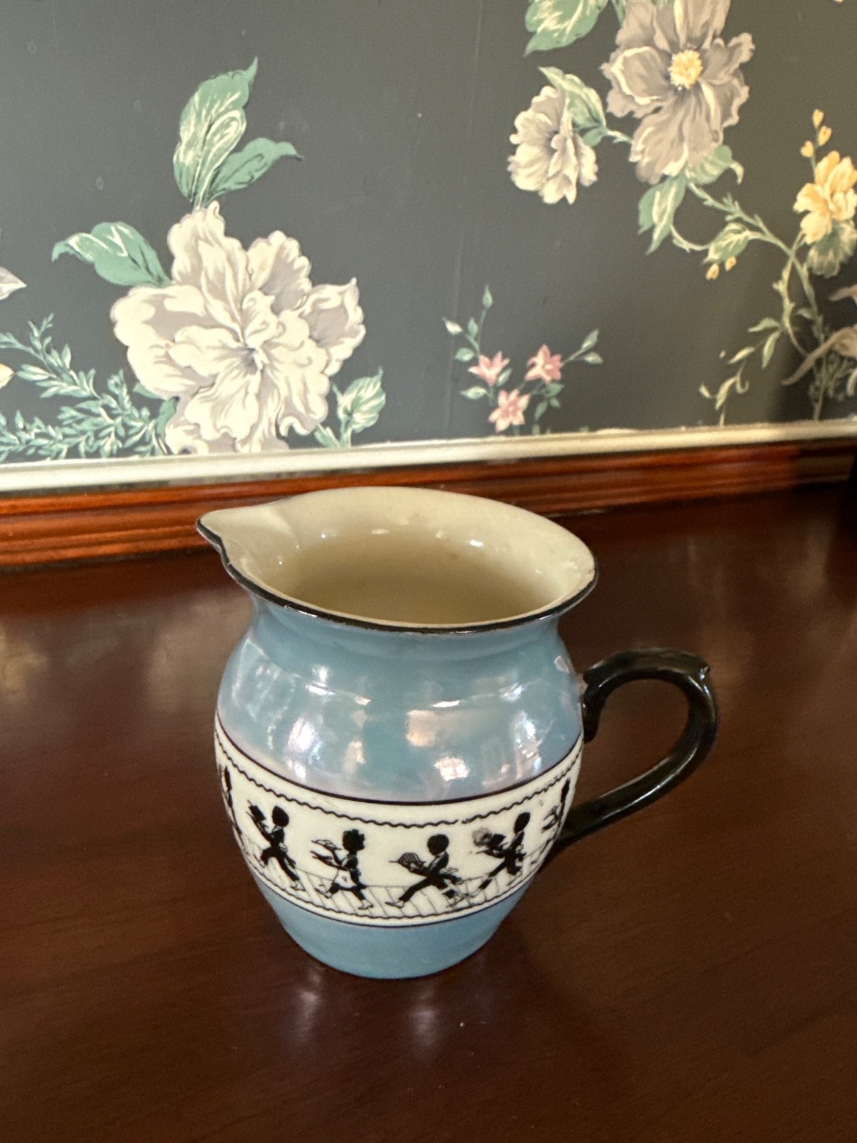 antique creamer pitcher. Not sure of brand , see picture . Beautiful pitcher