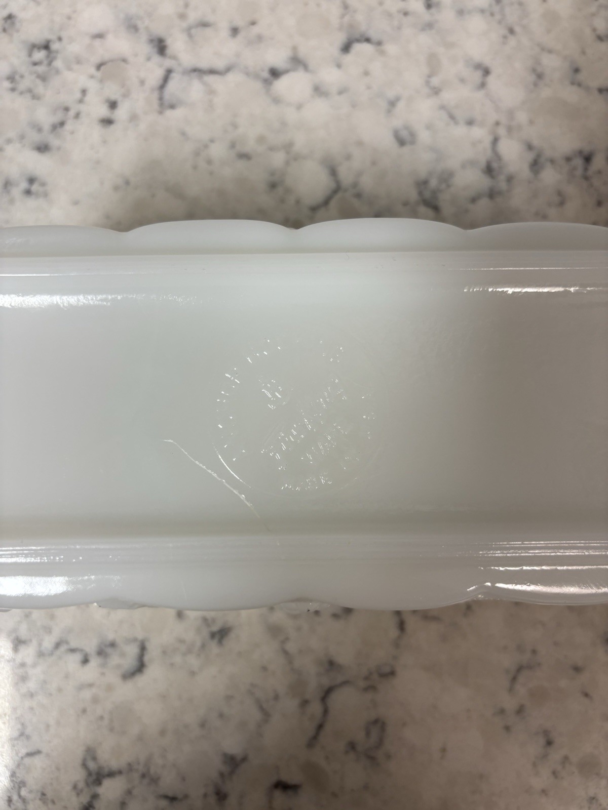 Anchor Hocking Fire King milk glass rectangular dish with grape pattern.