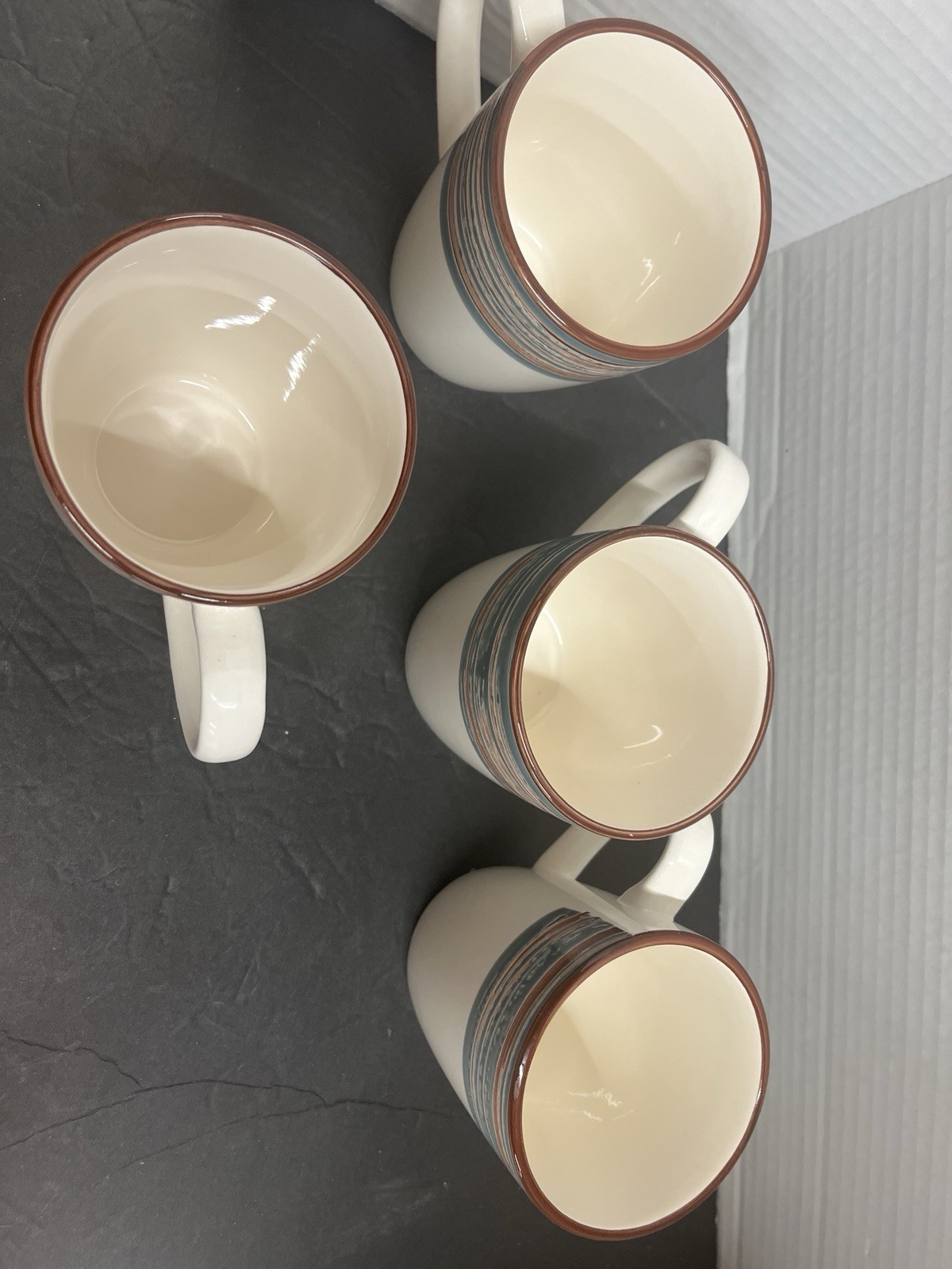 4 Citrus Grove Coffee Mugs Swirl Stripe Pottery Blue Gray Sunset