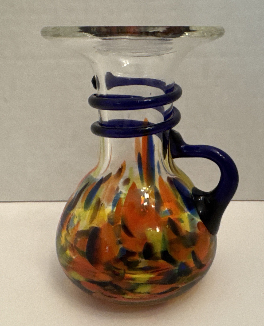 4.75” Hand Blown Pitcher Spatter Yellow Orange Glass Applied Cobalt Blue Handle