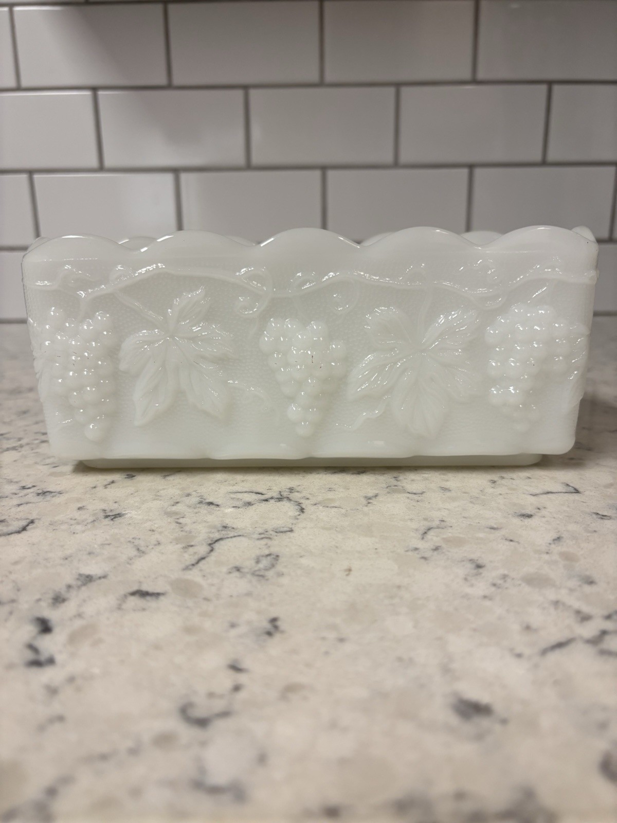 Anchor Hocking Fire King milk glass rectangular dish with grape pattern.