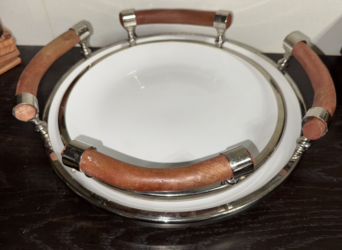 Set Of Two White Ceramic Salad Trys With Wooden Handles And Chrome Rims.