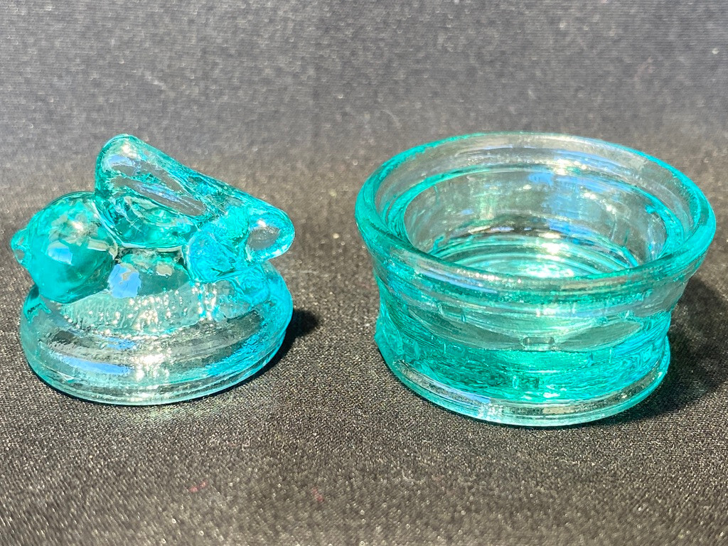 Green Vaseline uranium glass bunny rabbit on nest basket Easter glows teal blue
