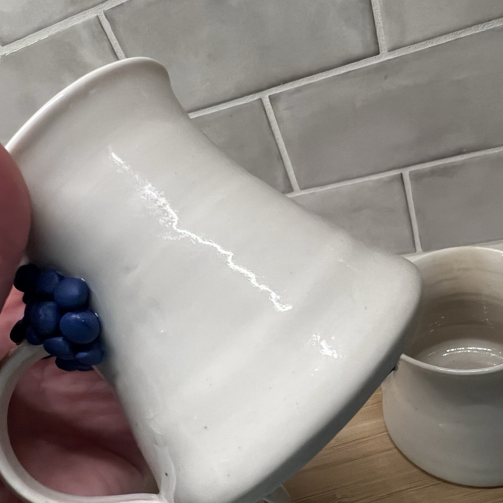 3 Handmade Pottery Mugs with blue grape design around handle, signed by artist