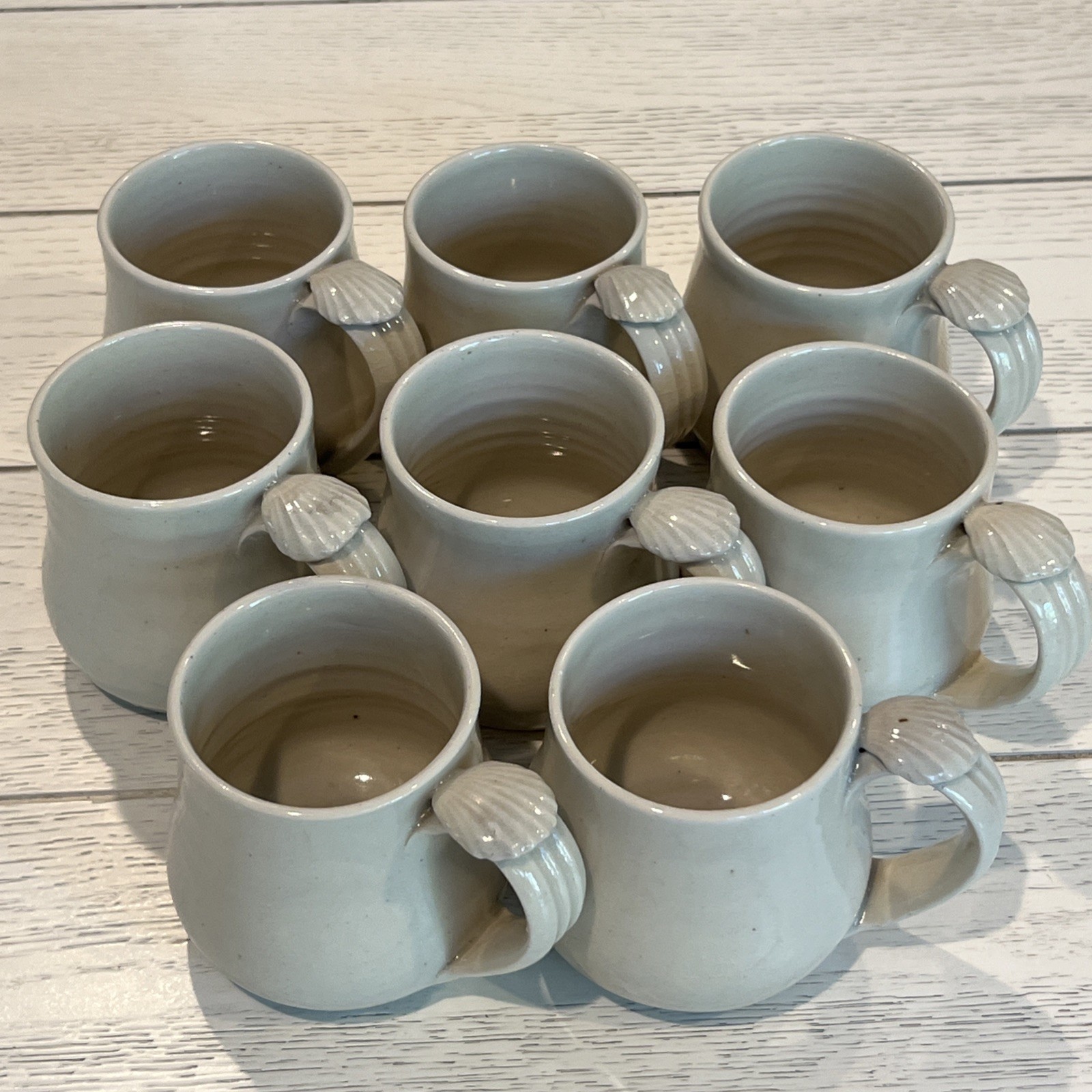 8 Pc Hand Thrown Beige Clay Pottery Coffee Tea Mugs Seashell Handle Stamped Set