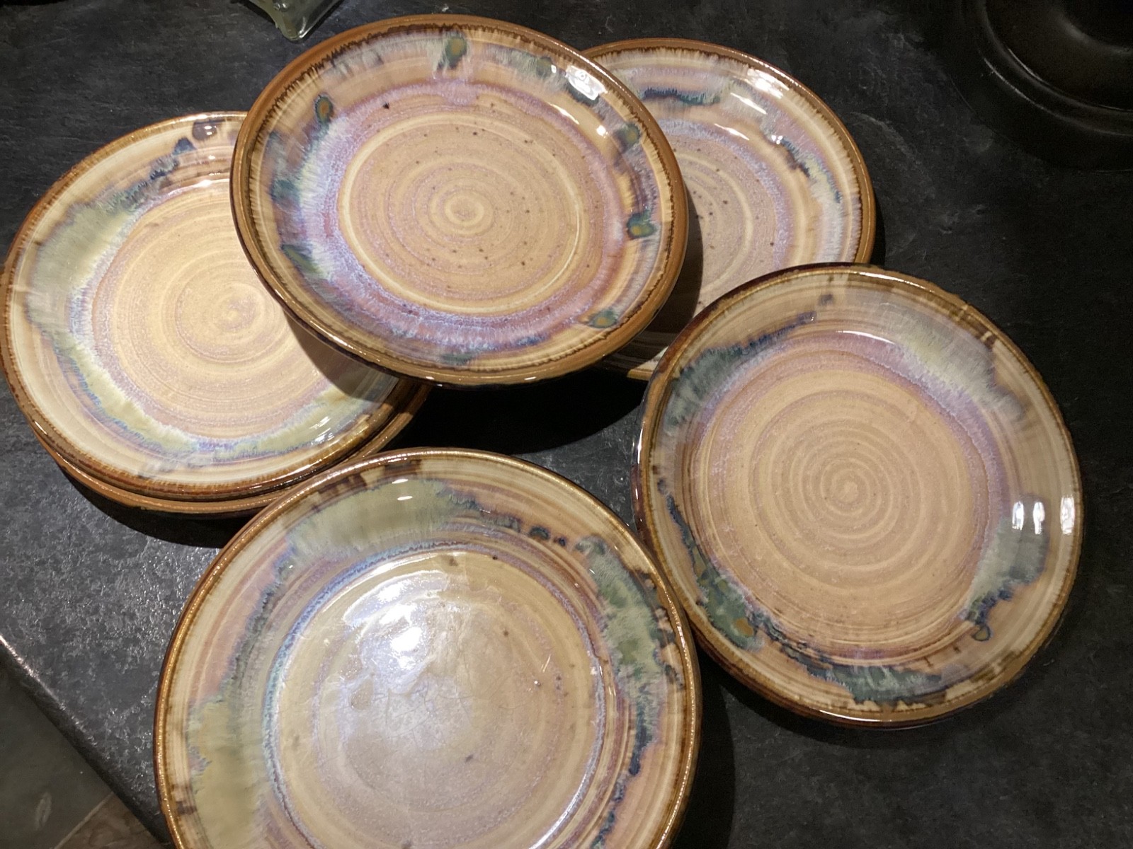 Vintage Greg Olson Handmade NINE Plates 7 1/2in Brown Rim Multicolor pre-owned