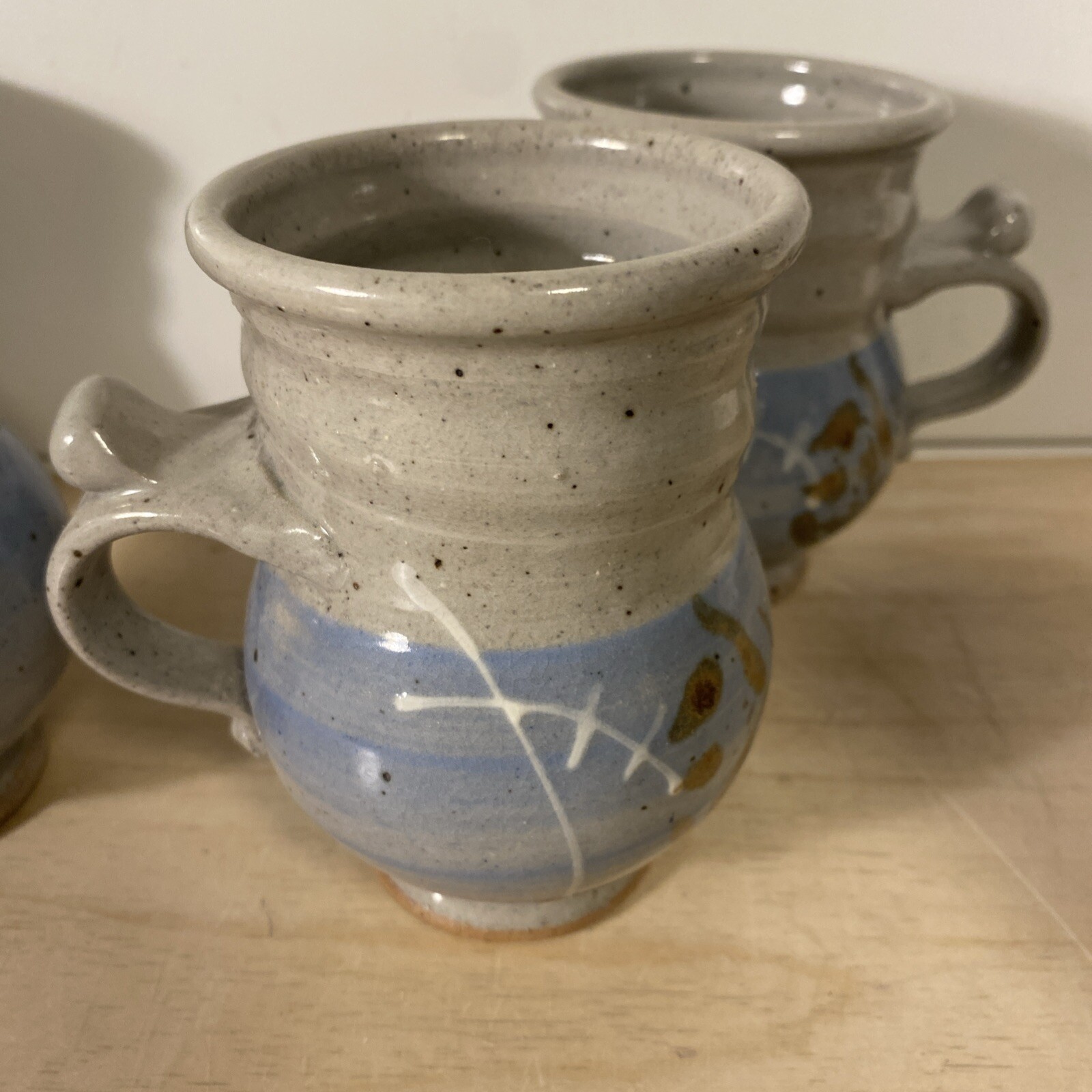4 Beautiful Handmade Pottery Coffee Cups Signed Blue Brown White Tan E.C.