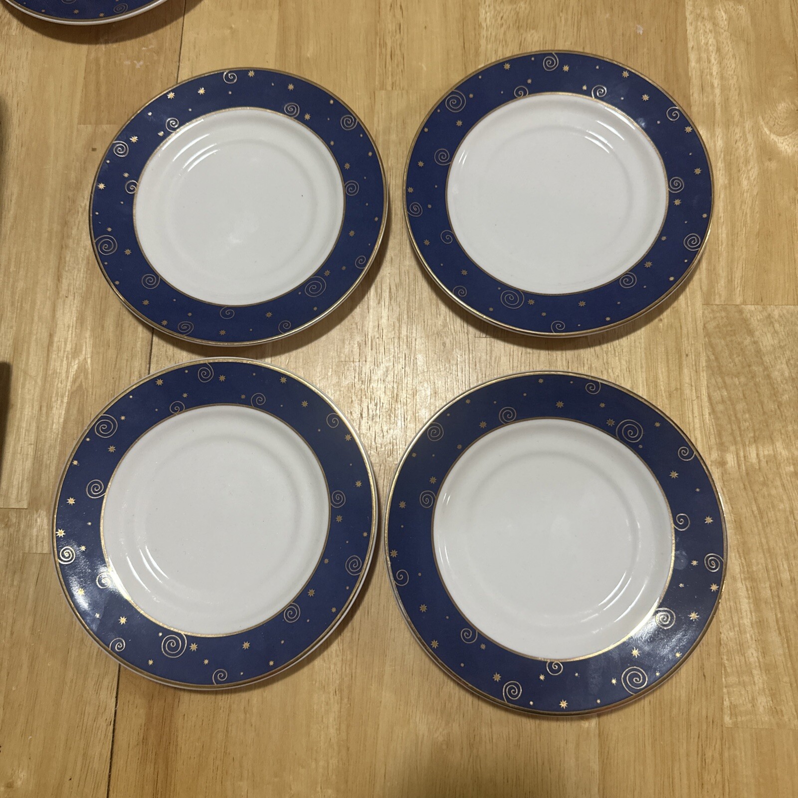 Set of 4 Sakura Hallmark Star Light Christmas Saucers Cobalt Blue/Gold Trim