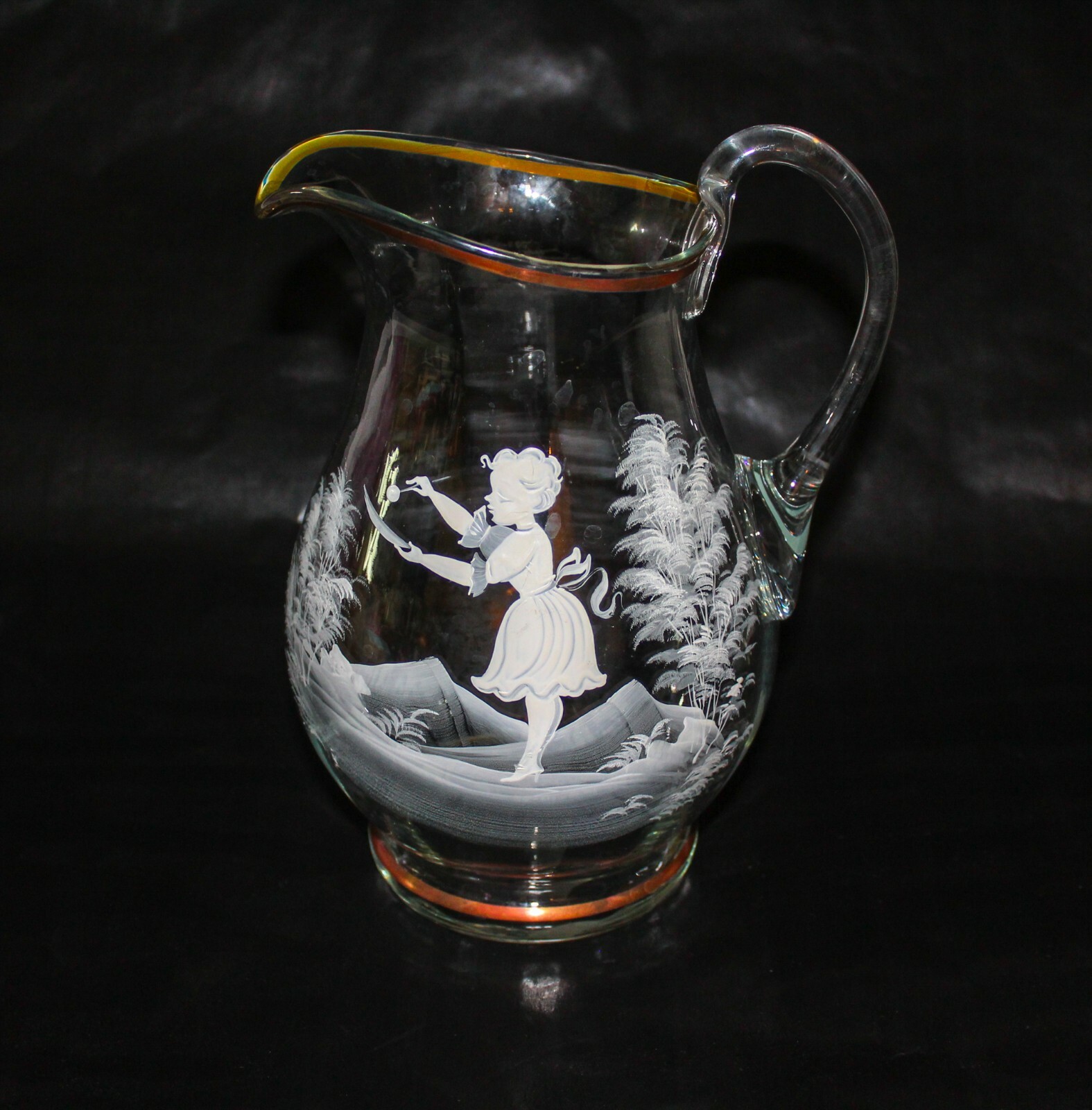 Mary Gregory Clear Glass 9 3/4″ Tall Handled Pitcher Hard to Find Version