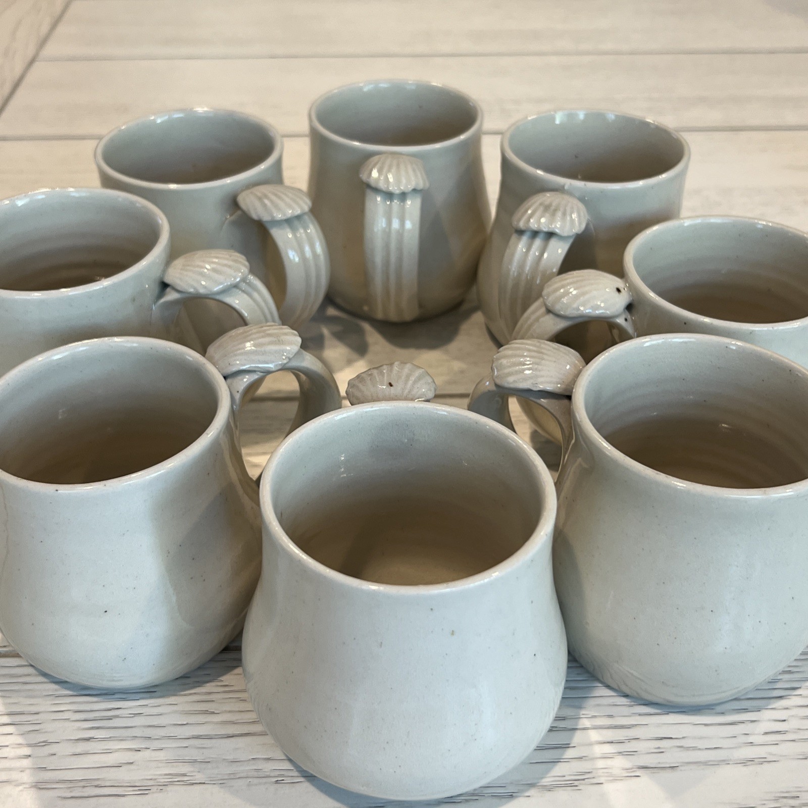 8 Pc Hand Thrown Beige Clay Pottery Coffee Tea Mugs Seashell Handle Stamped Set