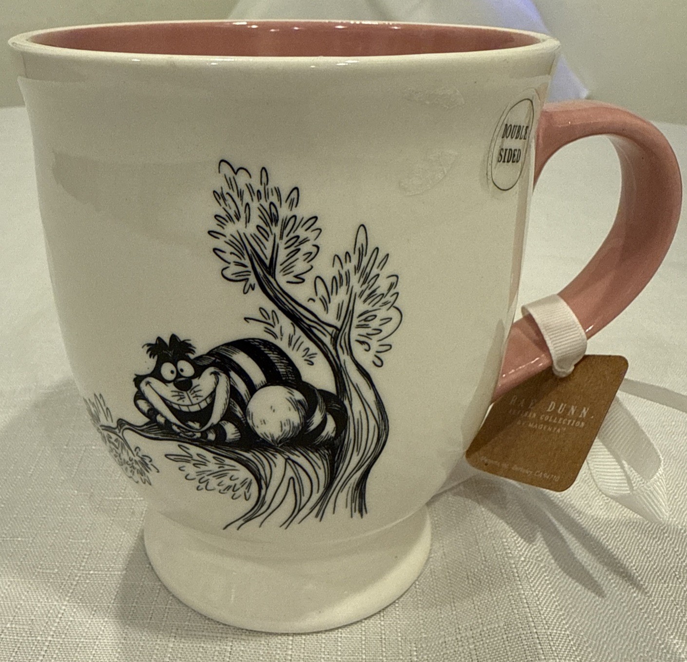 NWT Rae Dunn Disney Alice in Wonderland Mug We’re All Mad Here Cheshire Cat 20oz