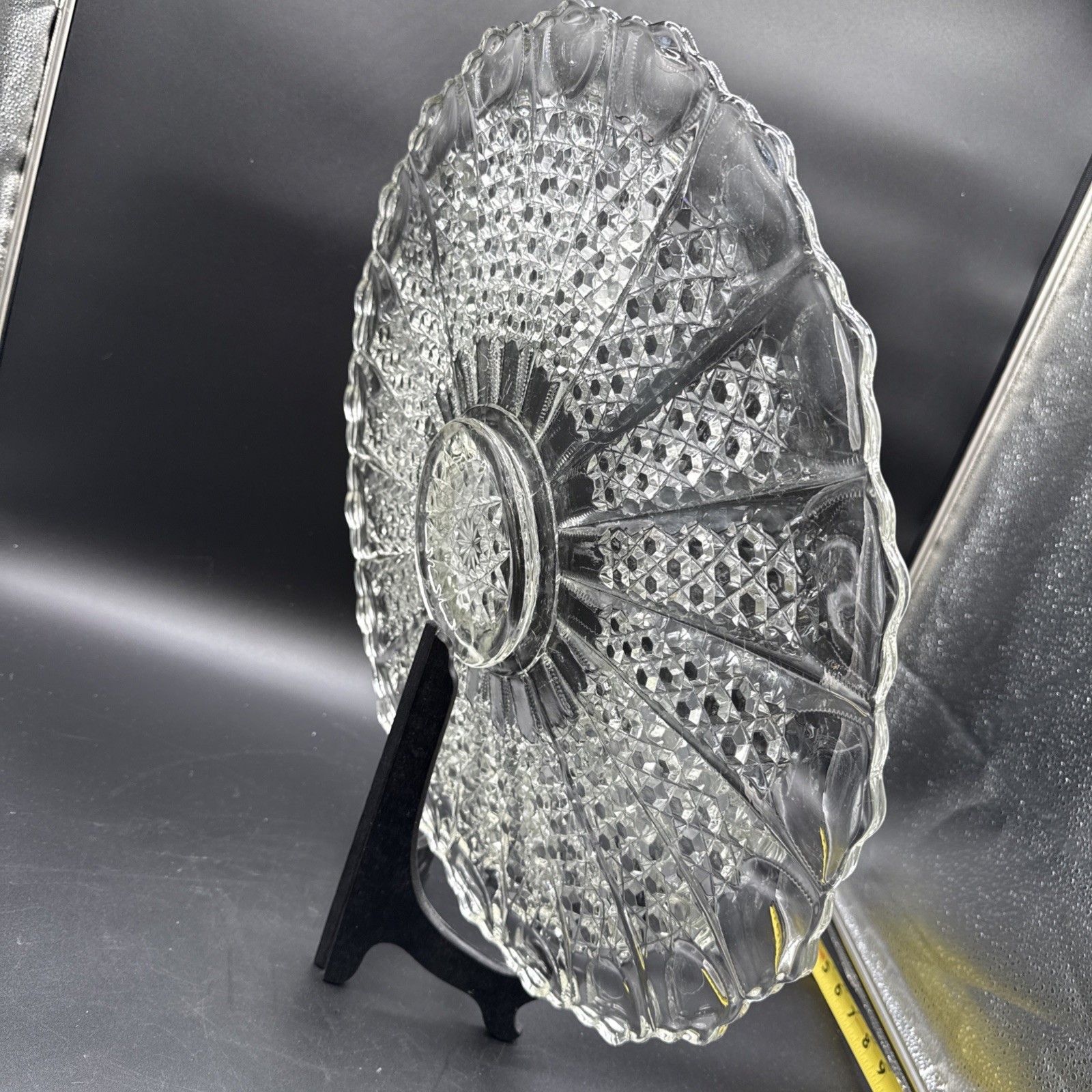 Cut crystal glass plate with radial diamond pattern