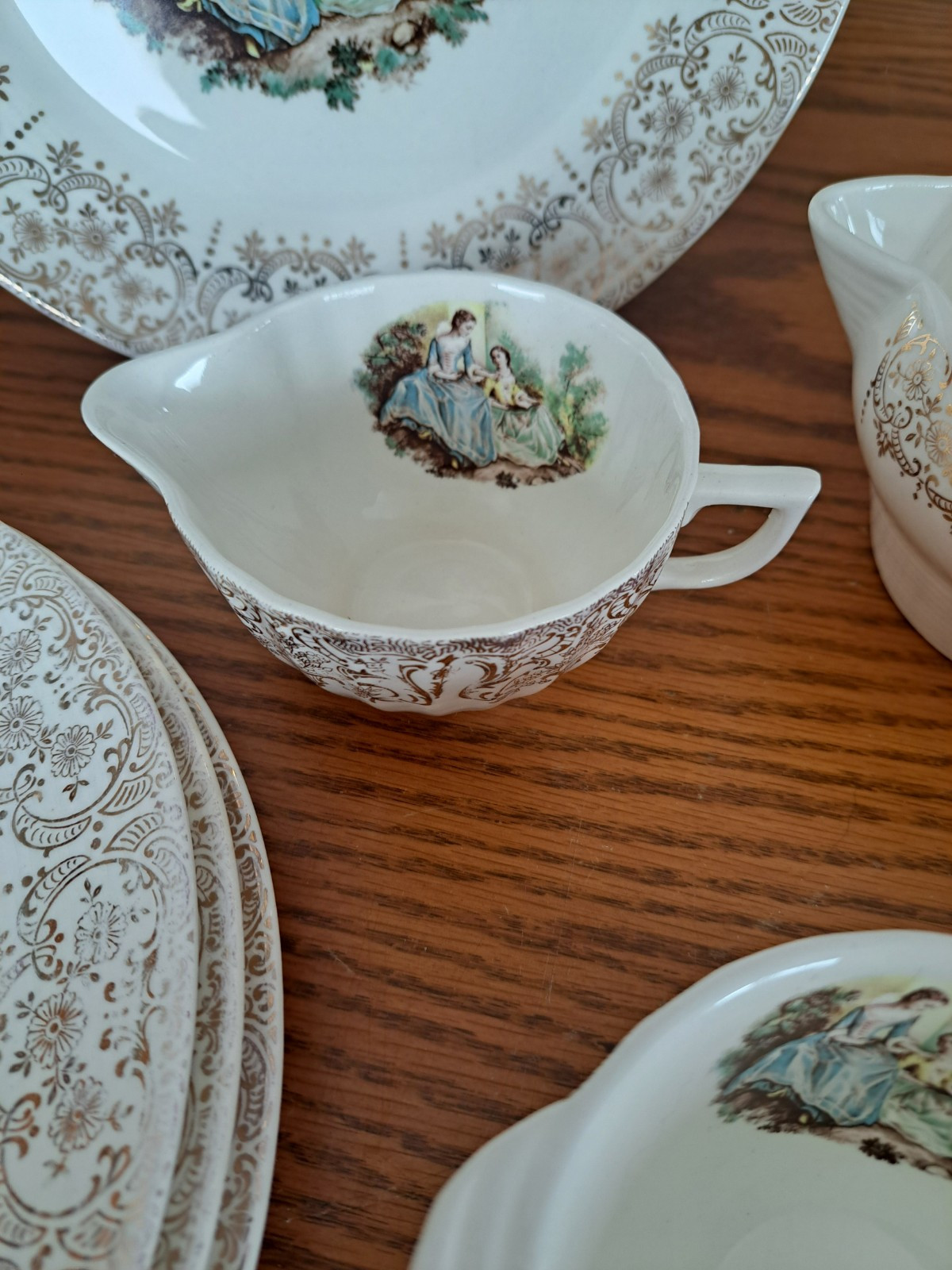 Triumph USA Limoges 22K China Triumph Courting Couples 11 Piece Grouping