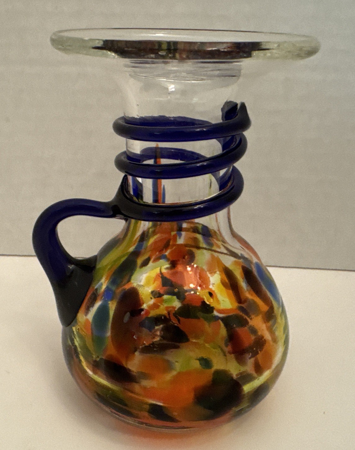 4.75” Hand Blown Pitcher Spatter Yellow Orange Glass Applied Cobalt Blue Handle