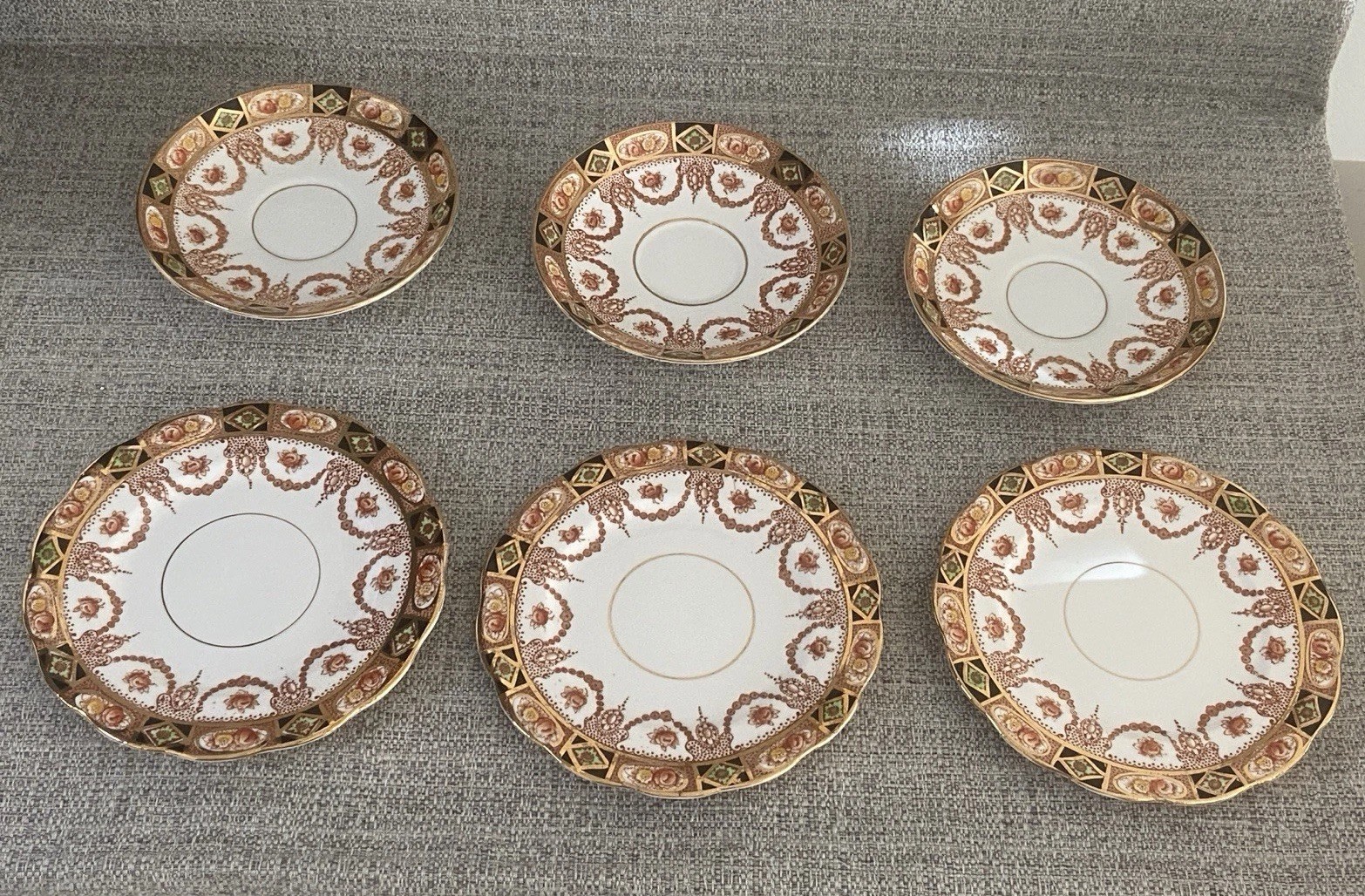 A matched set of 3 dessert plates + 3 saucers from Royal Albert Devon is absolut