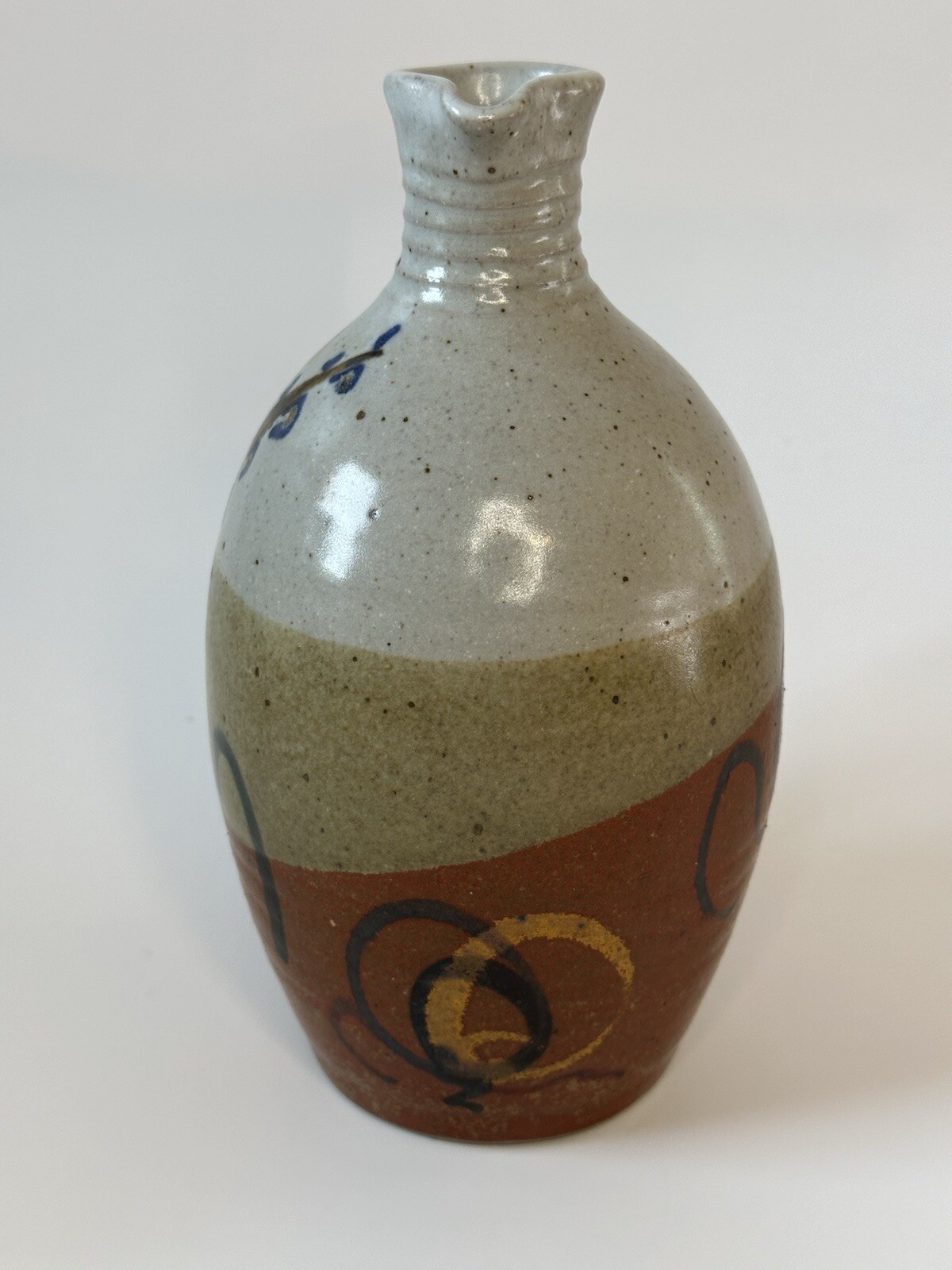 Signed AM stoneware jug, gray, tan, rust, blue, brown. Earthy Natural colors.