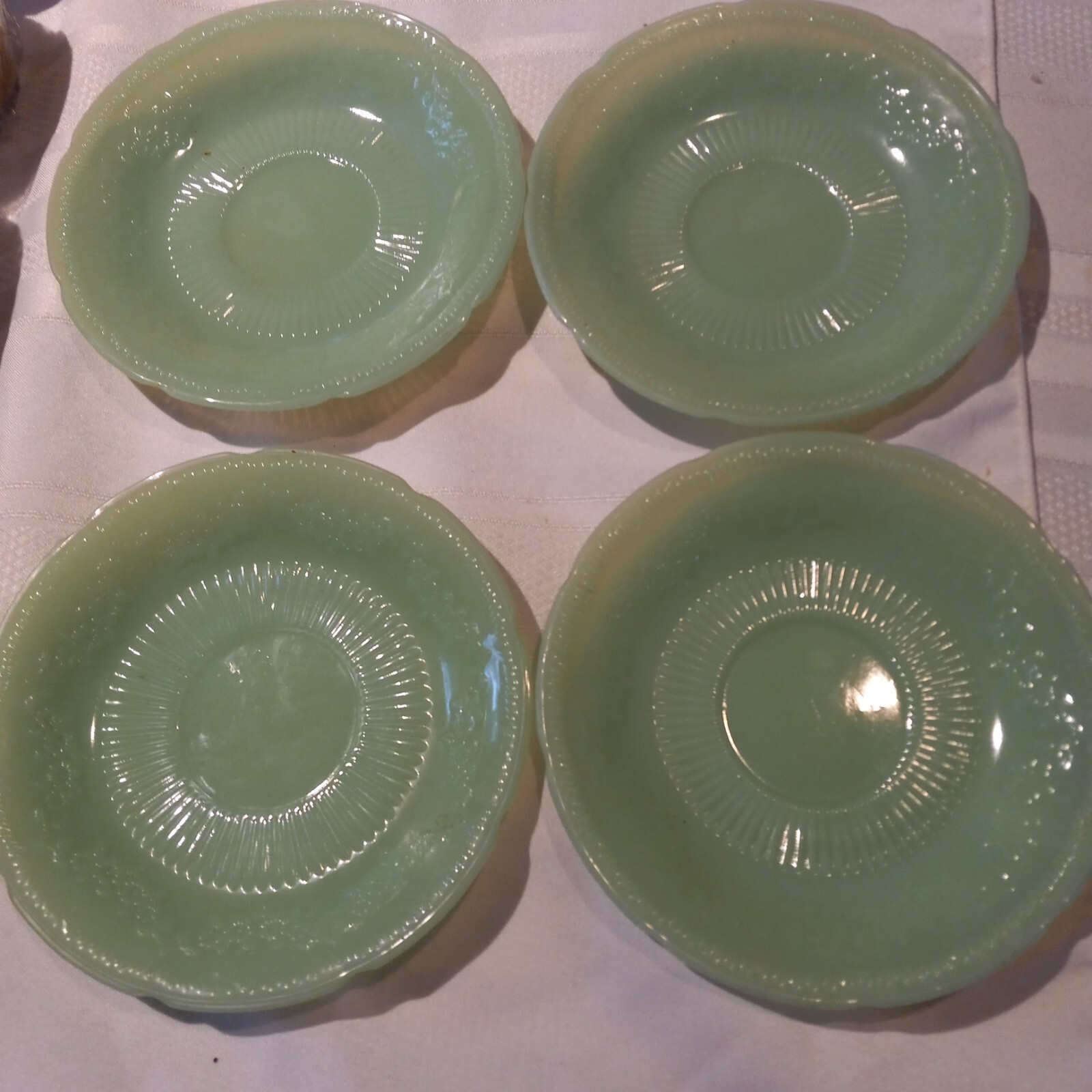 Four ALICE pattern Jadeite Anchor Hocking Saucers Nice Condition Replacecments