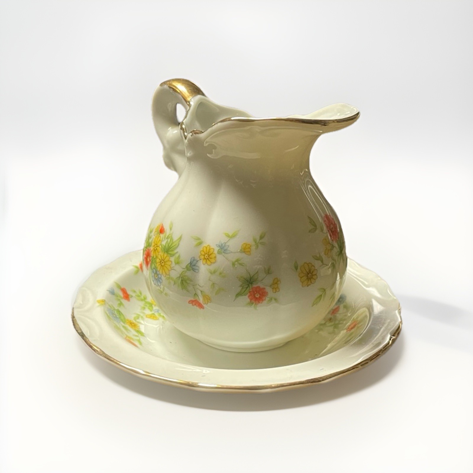 Vintage Lefton China miniature creamer pitcher and matching saucer (floral)