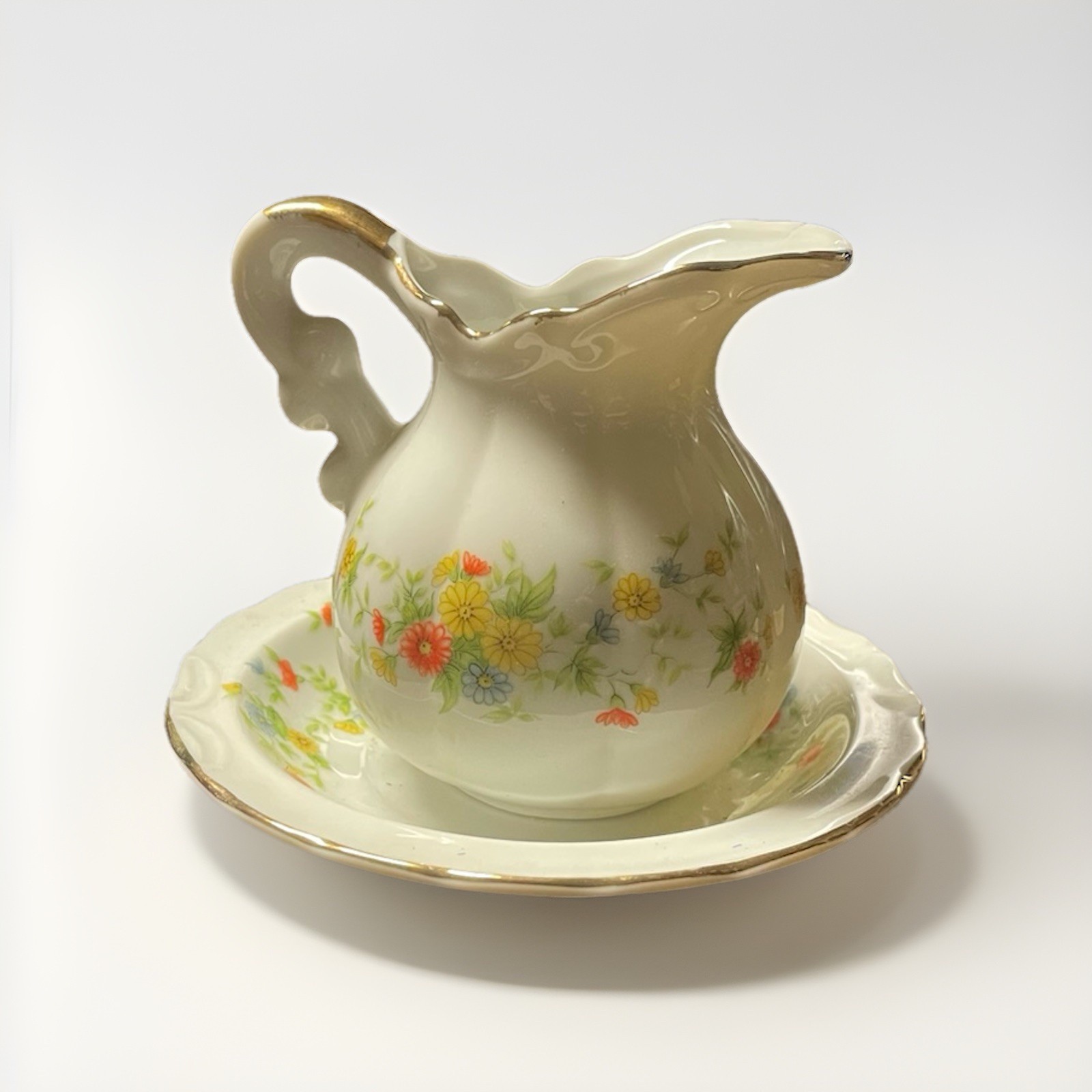 Vintage Lefton China miniature creamer pitcher and matching saucer (floral)