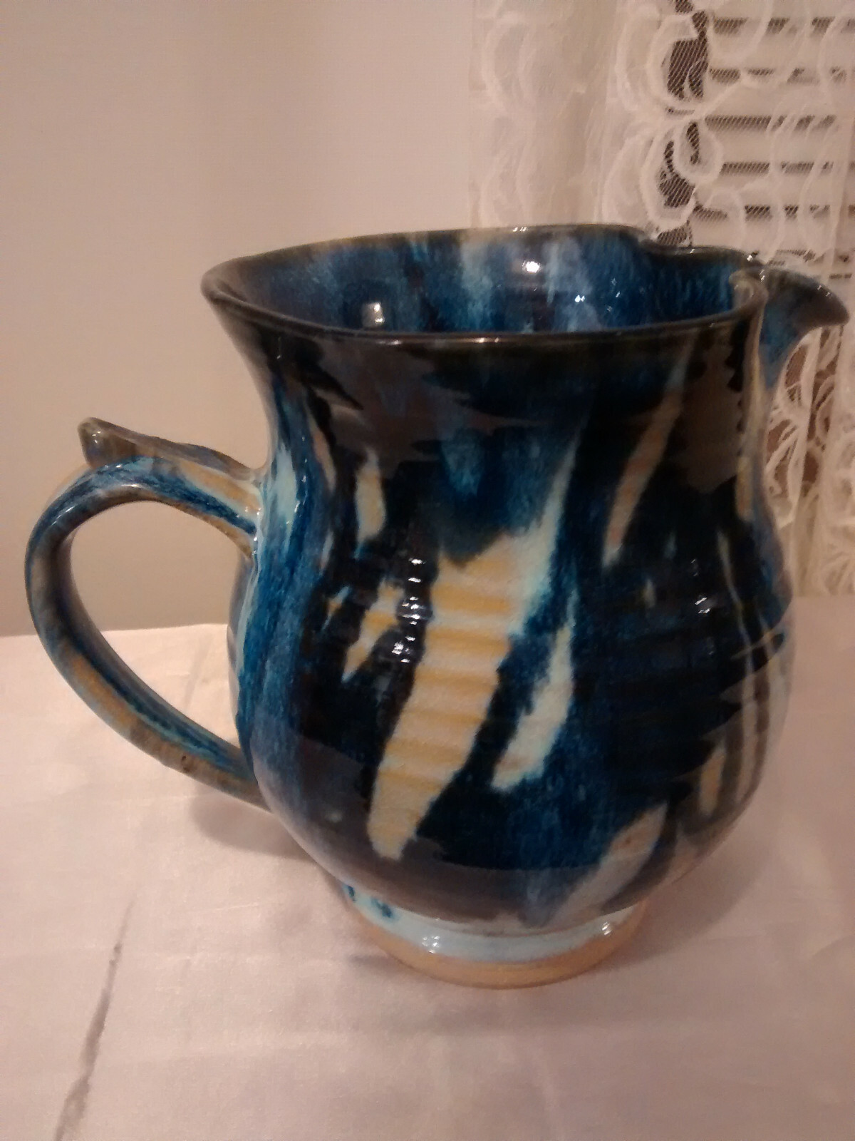 Pottery Pitcher Blue Grey Tan 7 1/4 Inches Tall Pinched Spout Thumb Rest Handle