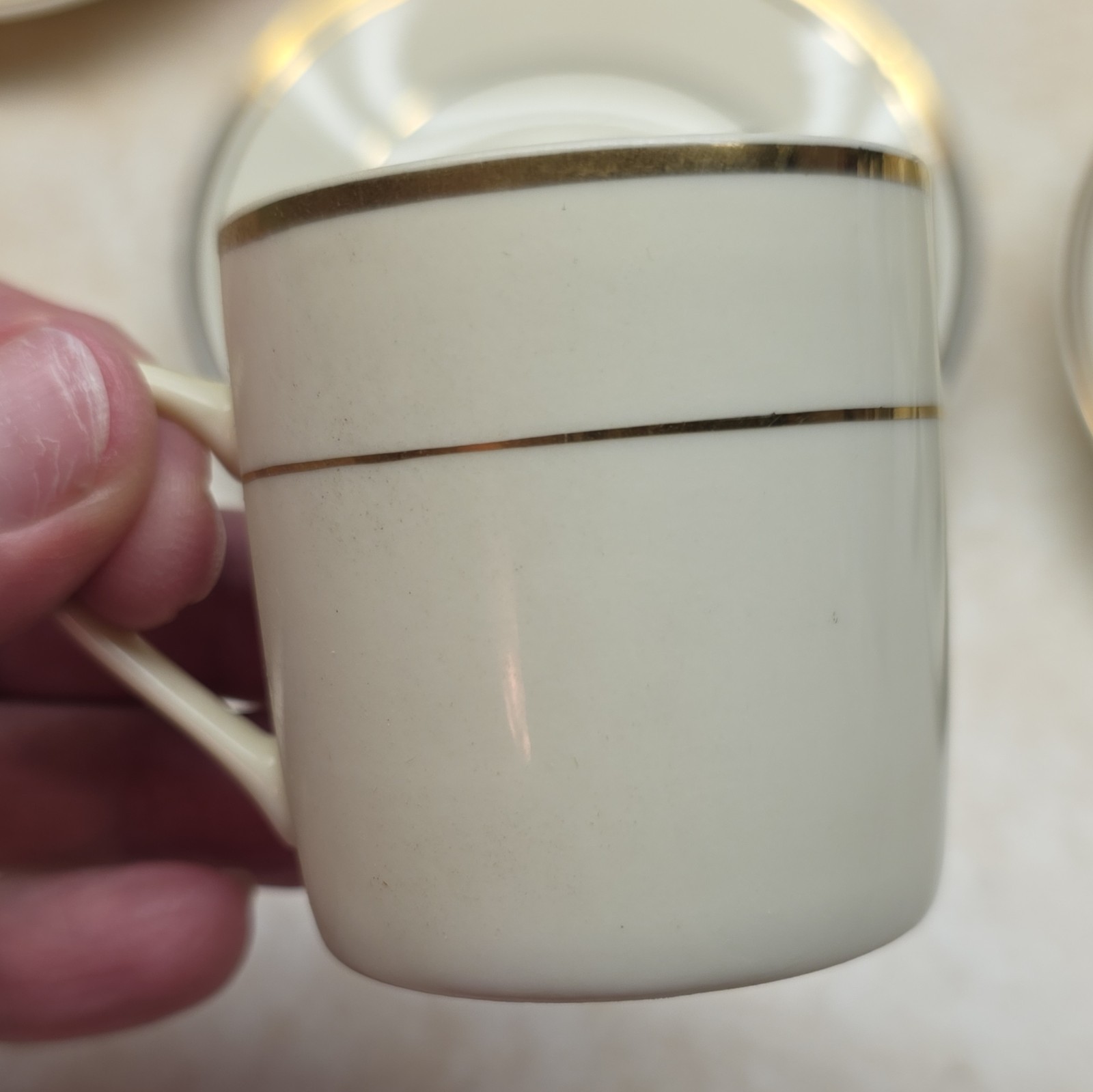 Toscany Collection China Ivory Gold Cup & Saucer Set Twelve-Piece Glossy Finish