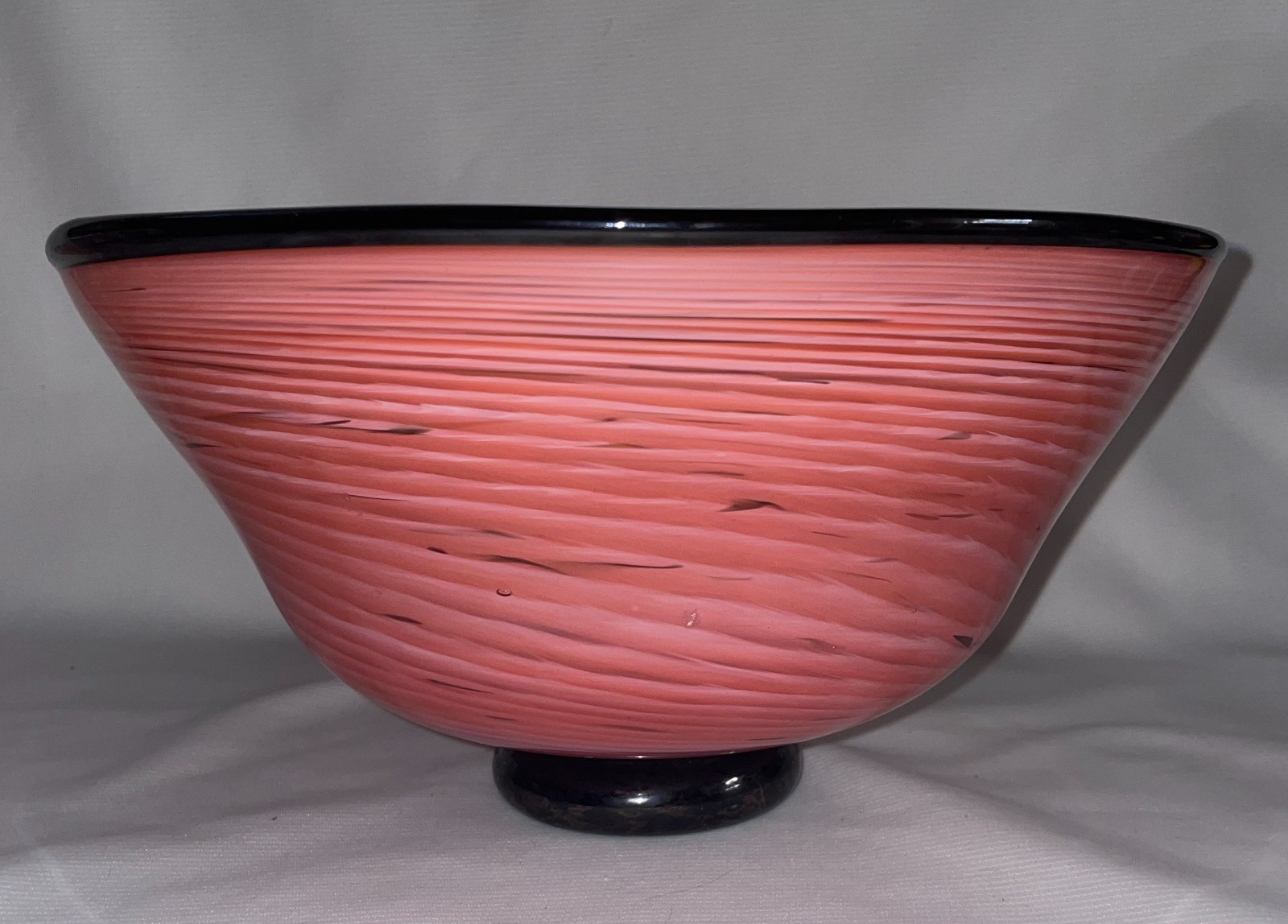 Hand Blown Pink Swirl Pattern Bowl W/ Black Base & Rim10 1/2 Inches Wide