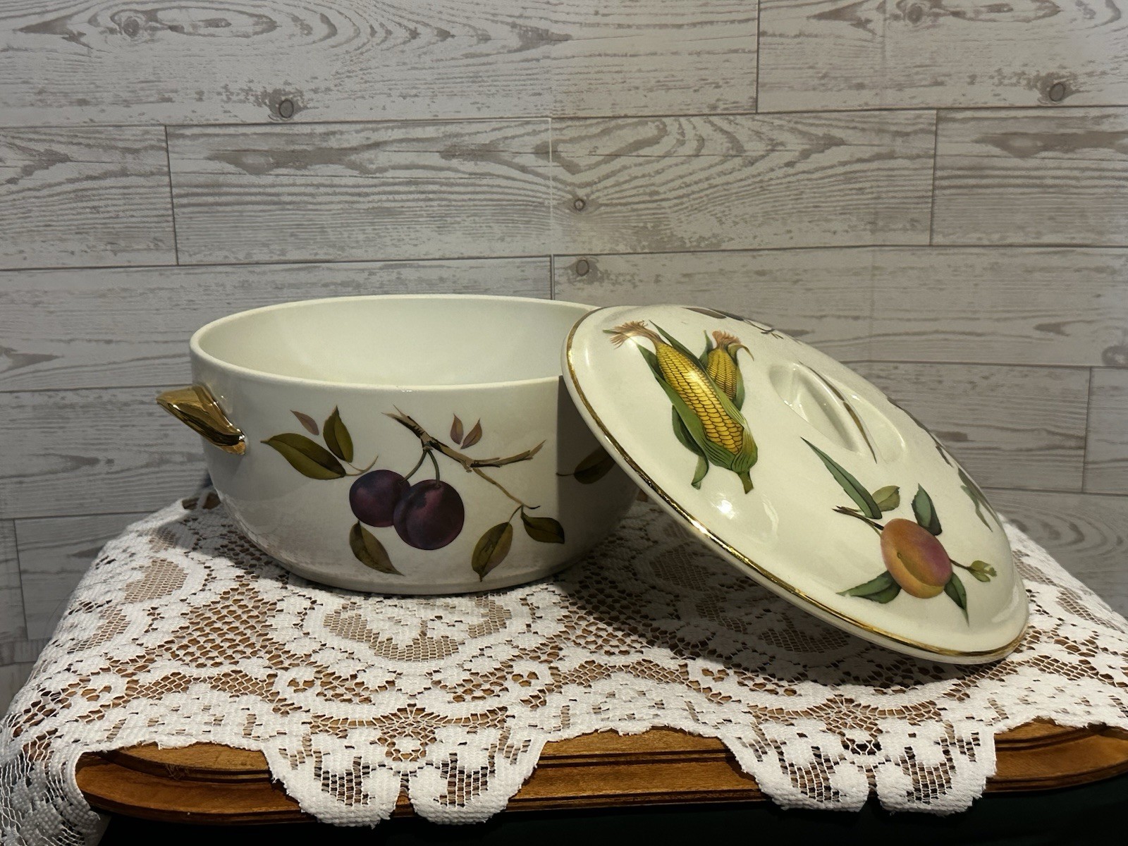 Set of three Royal Worcester Evesham Gold porcelain serving dishes with lids.