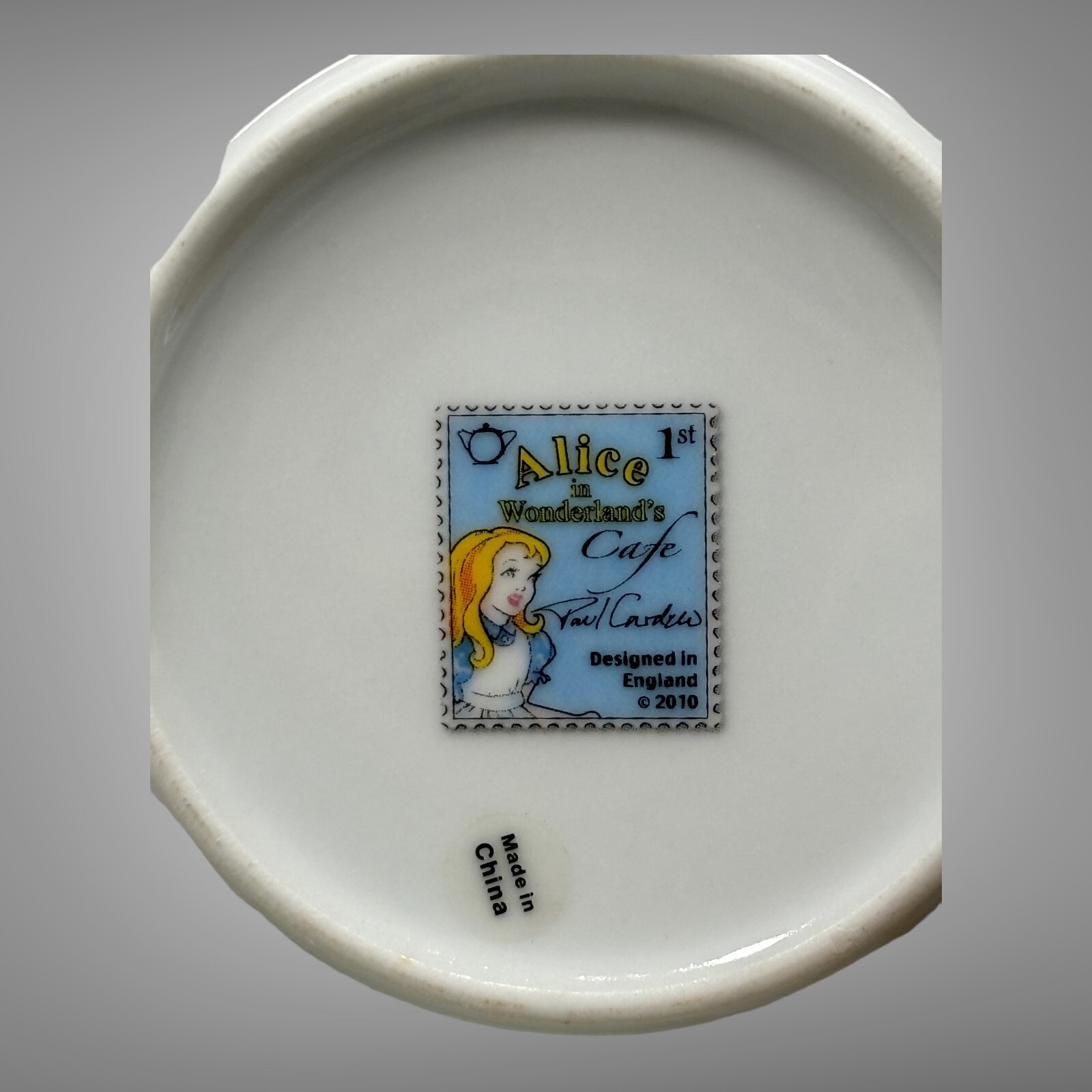 New 2010 Paul Cardew Alice in Wonderland Cafe Teacup & Saucers Set of 2 England