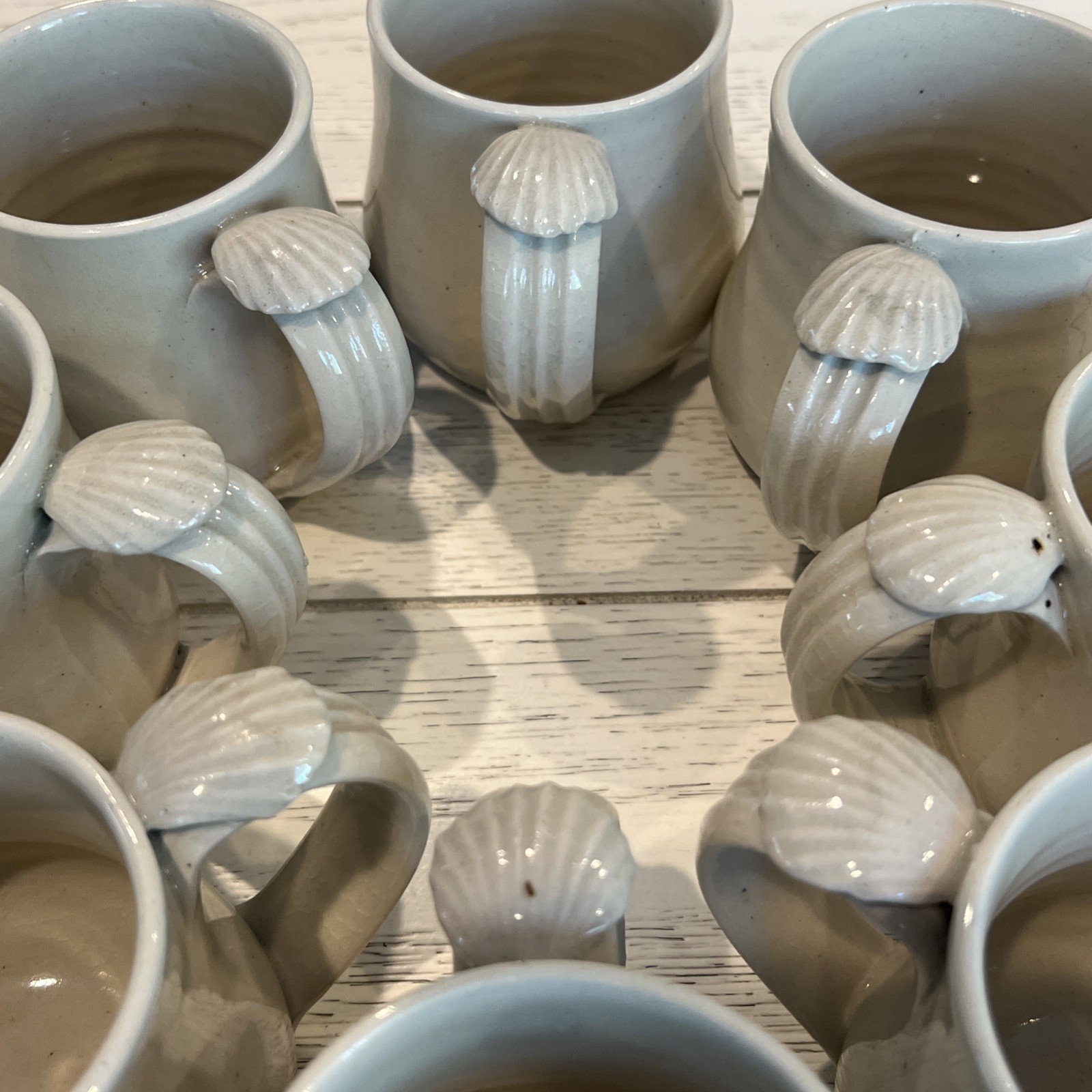 8 Pc Hand Thrown Beige Clay Pottery Coffee Tea Mugs Seashell Handle Stamped Set