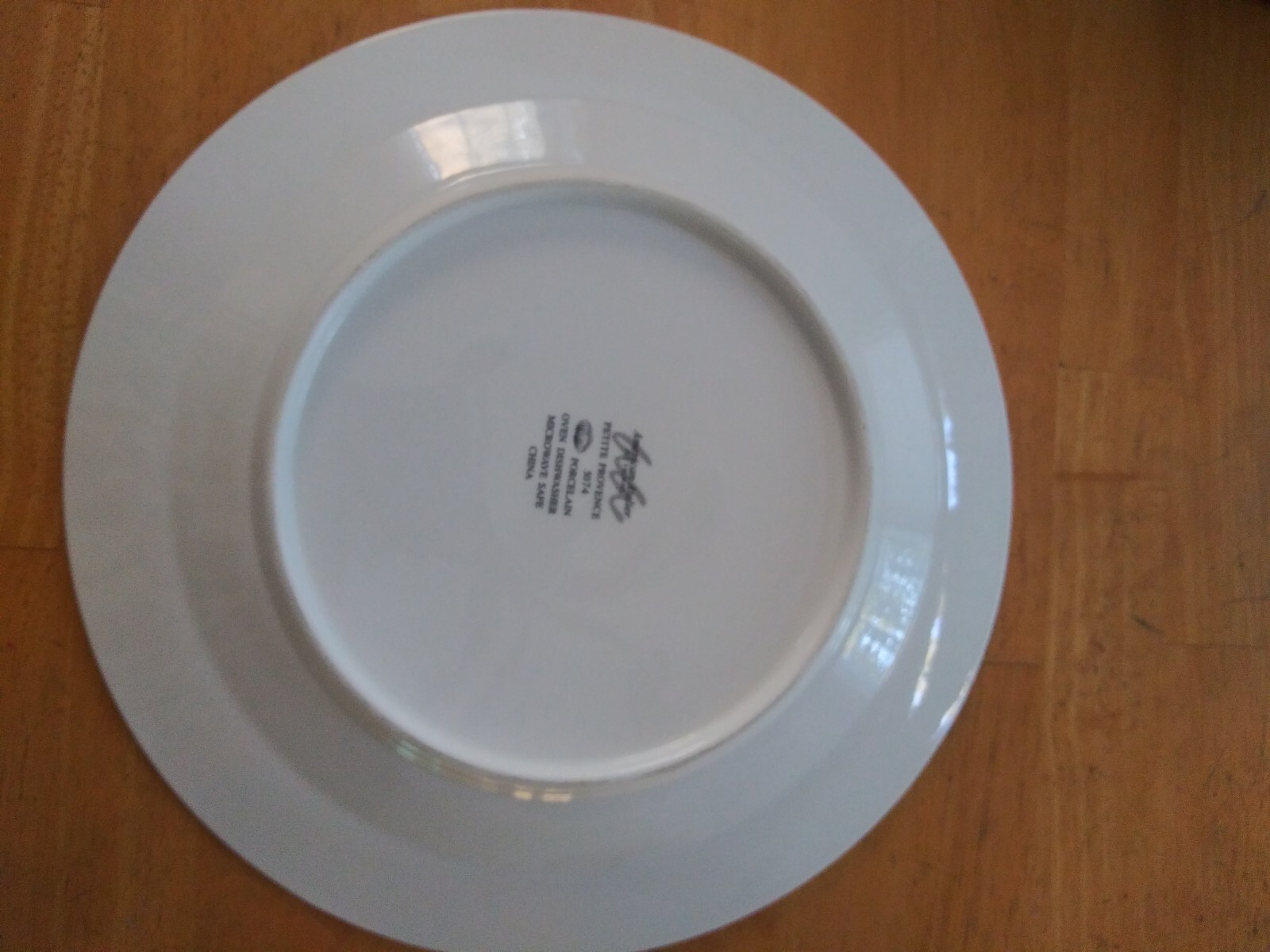 American Atelier Petite Provence 5074 Dinner plate with flaw. See 2nd picture.