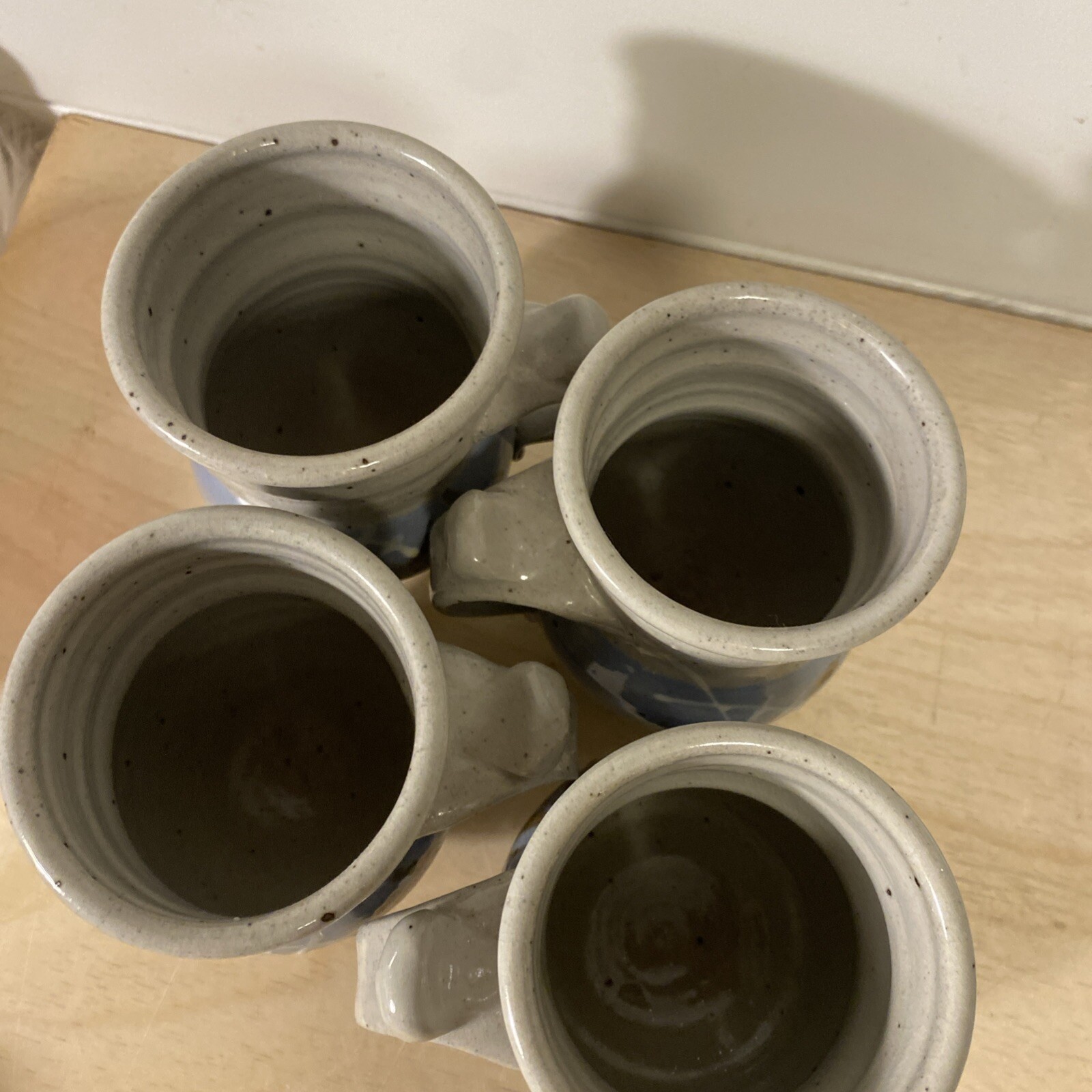 4 Beautiful Handmade Pottery Coffee Cups Signed Blue Brown White Tan E.C.