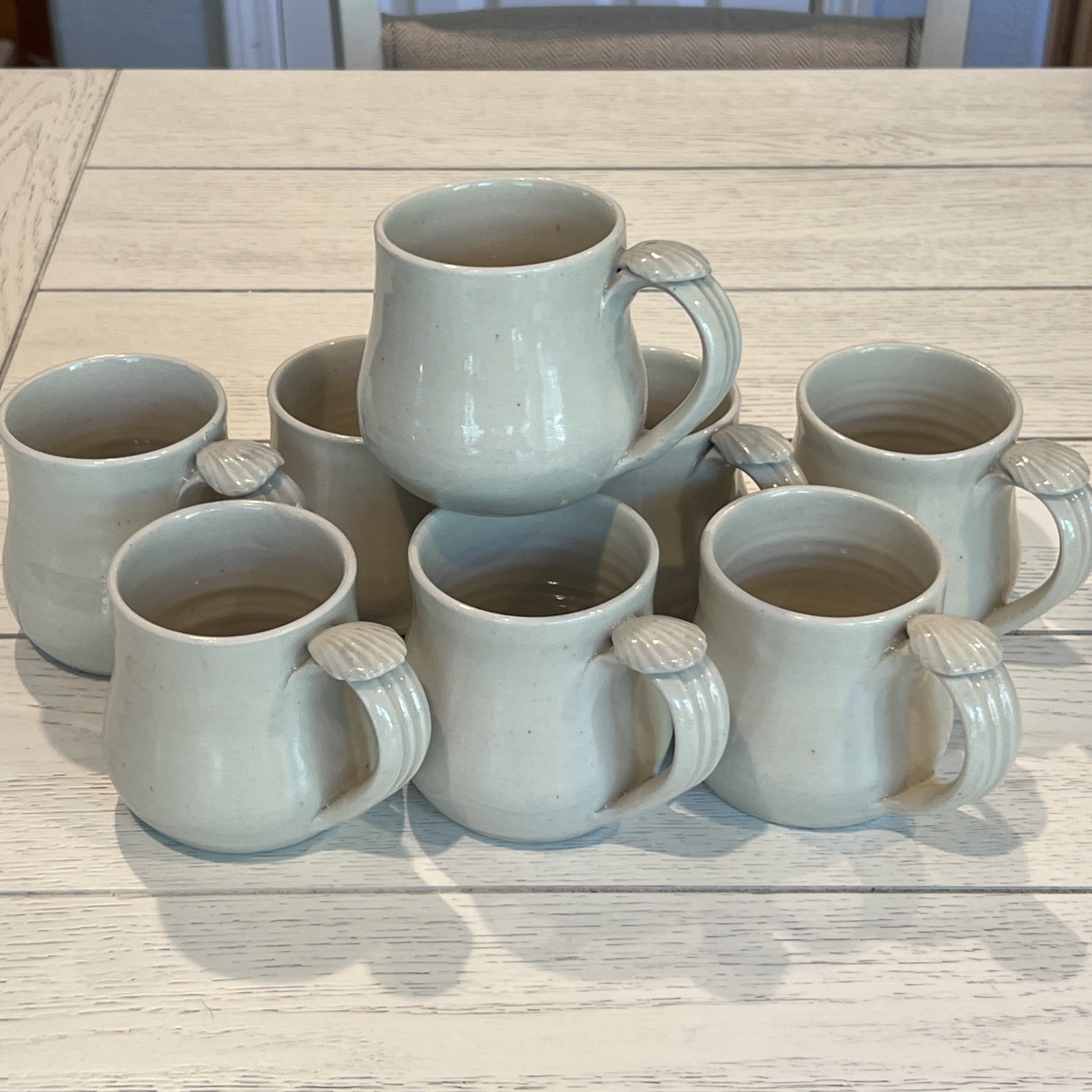 8 Pc Hand Thrown Beige Clay Pottery Coffee Tea Mugs Seashell Handle Stamped Set
