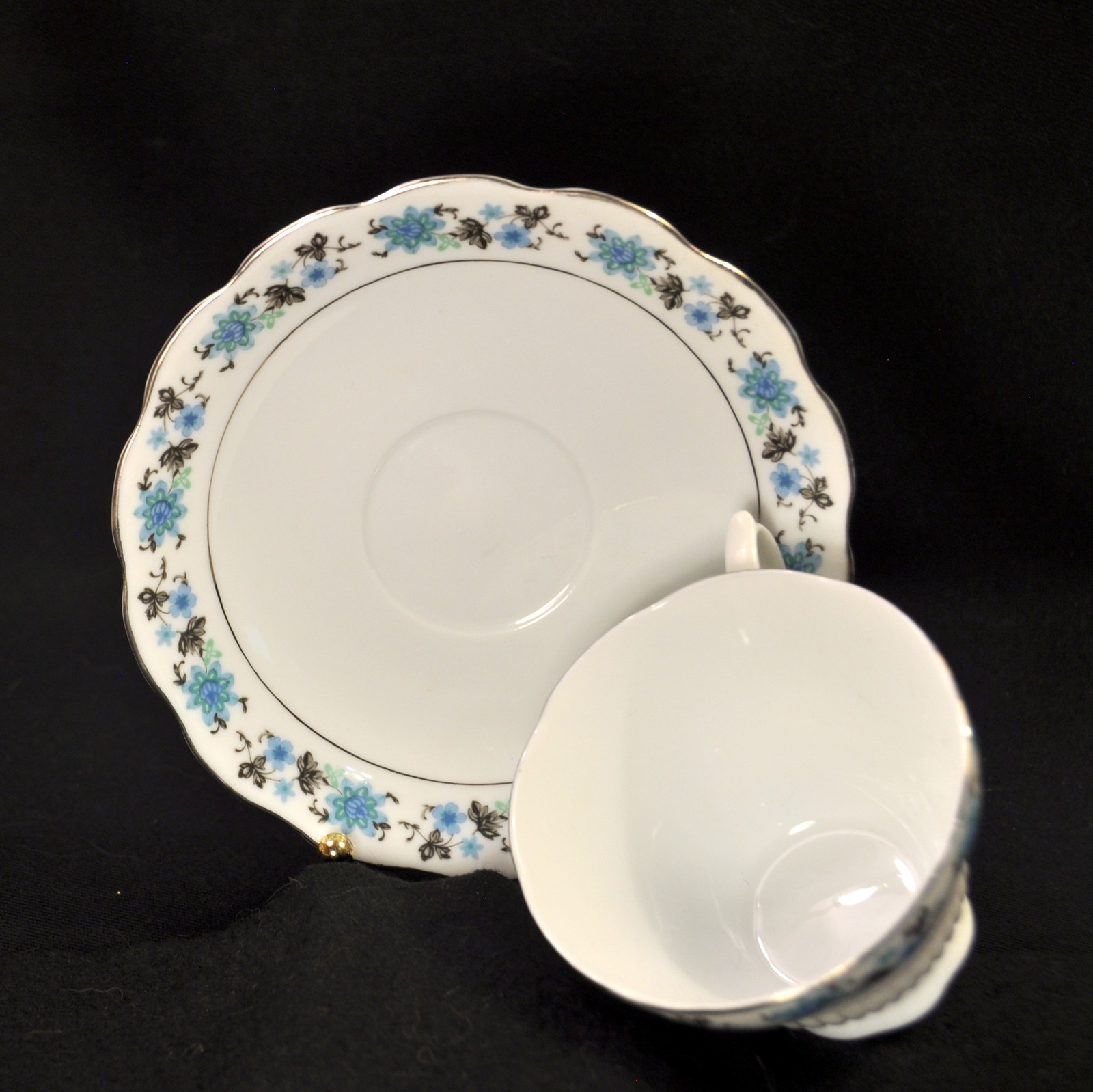 Cup & Saucer Floral w/Platinum on White Blue Black Scalloped Made in China