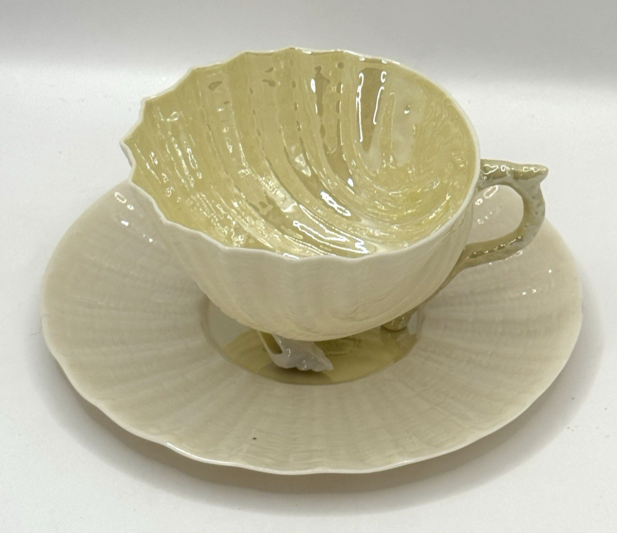 Belleek Neptune Shell Footed Cup and Saucer Yellow Ireland ~ Green Mark
