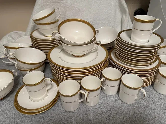 Royal Doulton “Royal Gold” dinnerware, plates, cups, serveware