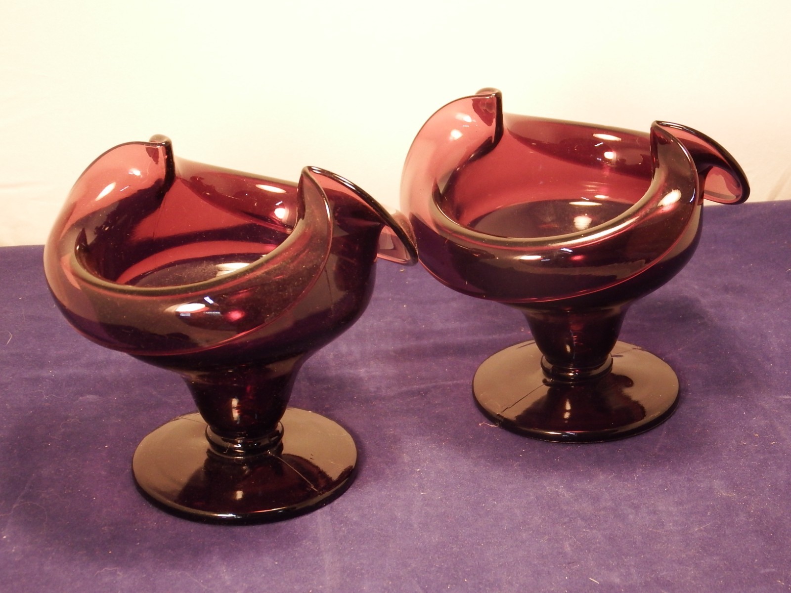 PAIR OF AMETHYST DEEP PURPLE GLASS DUAL PINCHED SIDES PEDESTAL CANDY DISHES 5″