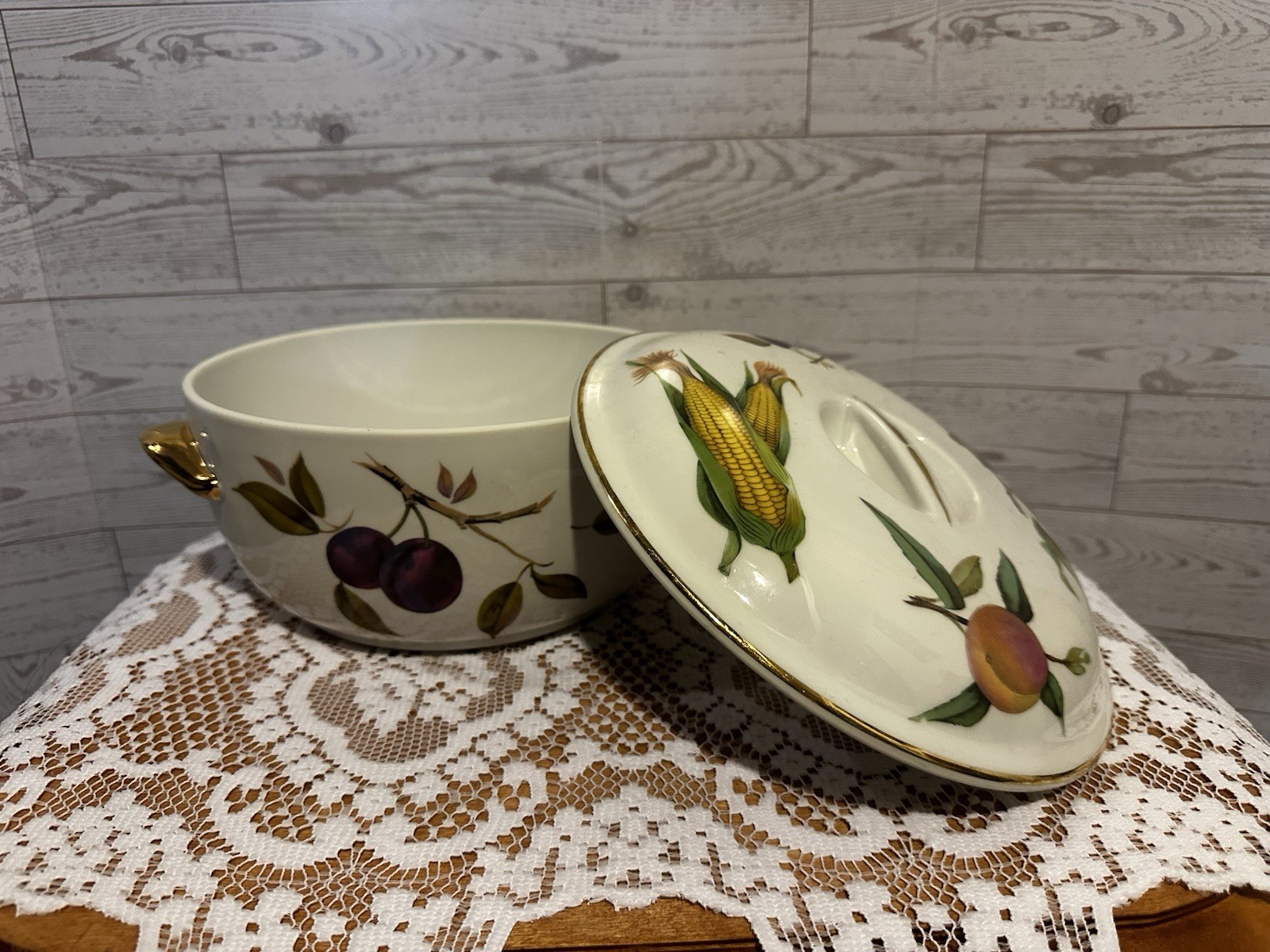 Set of three Royal Worcester Evesham Gold porcelain serving dishes with lids.