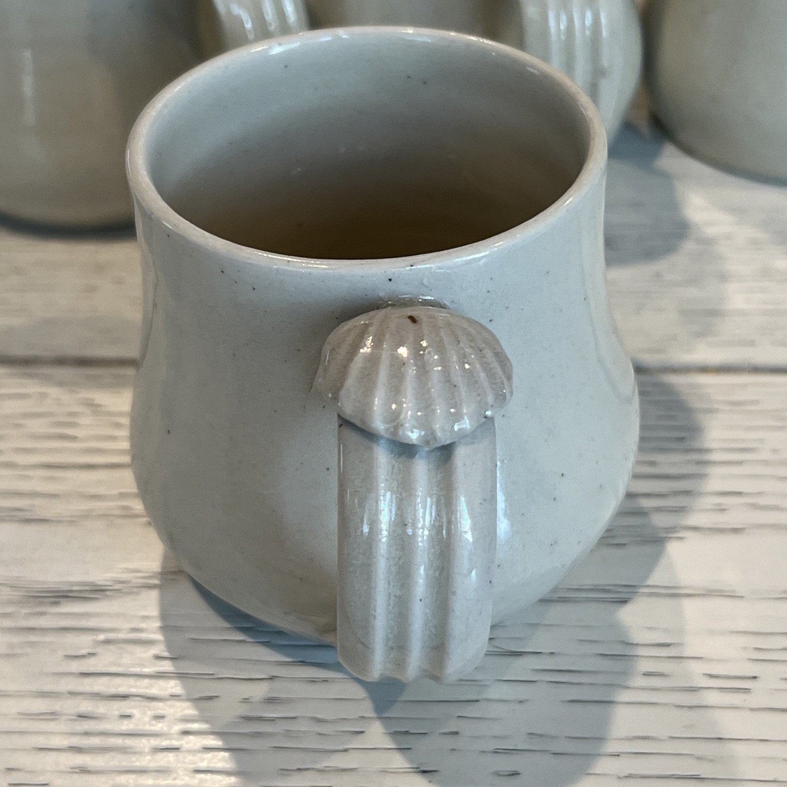 8 Pc Hand Thrown Beige Clay Pottery Coffee Tea Mugs Seashell Handle Stamped Set