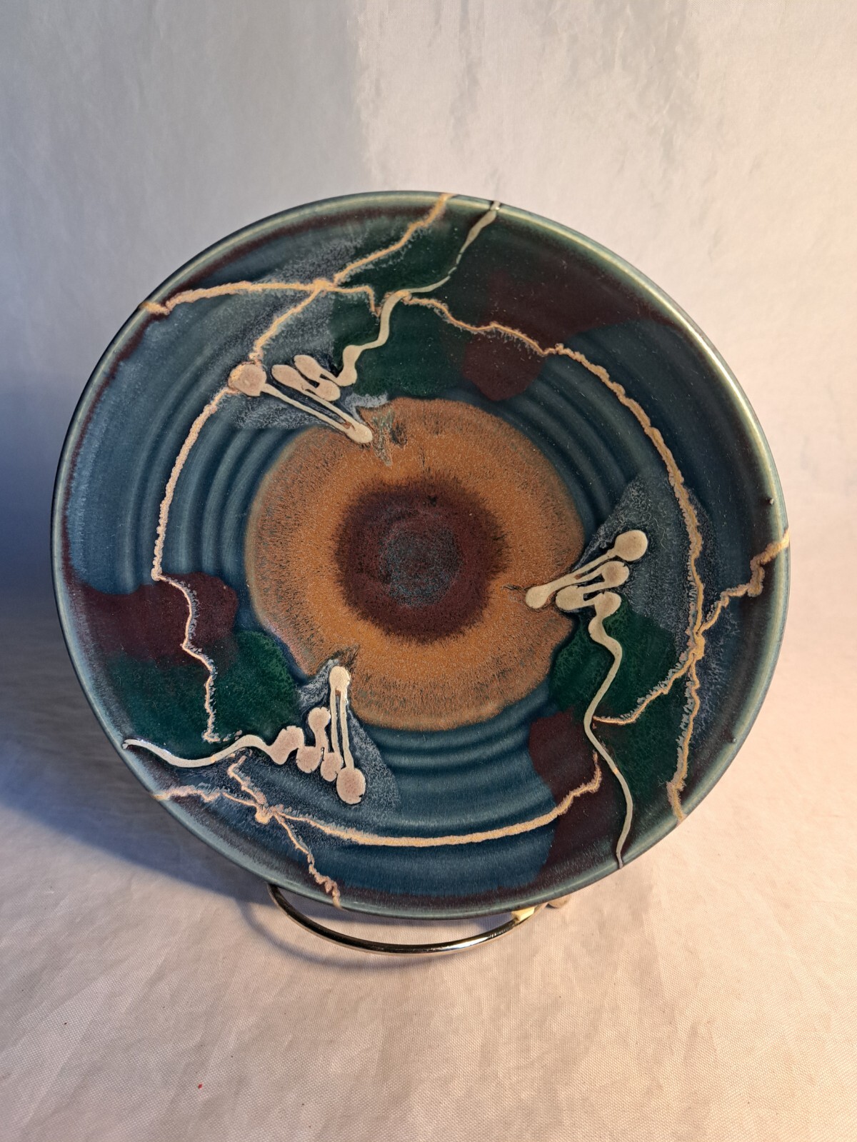 Blue /brown/tan and grey pottery bowl, use for food or trinkets. 7.5″ diameter.