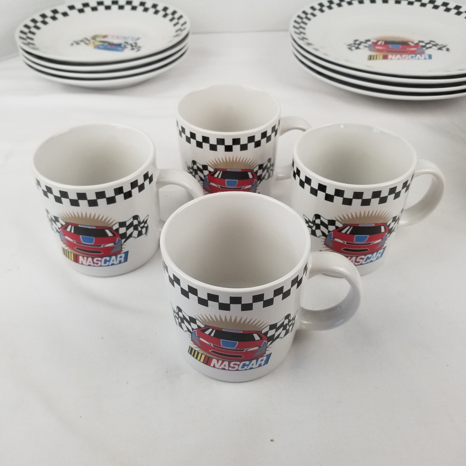 Gibson Nascar Victory Dinnerware Set Service for four 16 pieces Racing Checkered