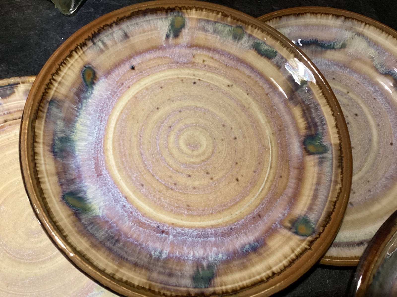 Vintage Greg Olson Handmade NINE Plates 7 1/2in Brown Rim Multicolor pre-owned