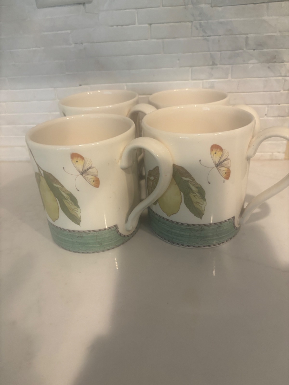4 Wedgewood Sarah’s garden 16 oz coffee cups, one has chip look at photos
