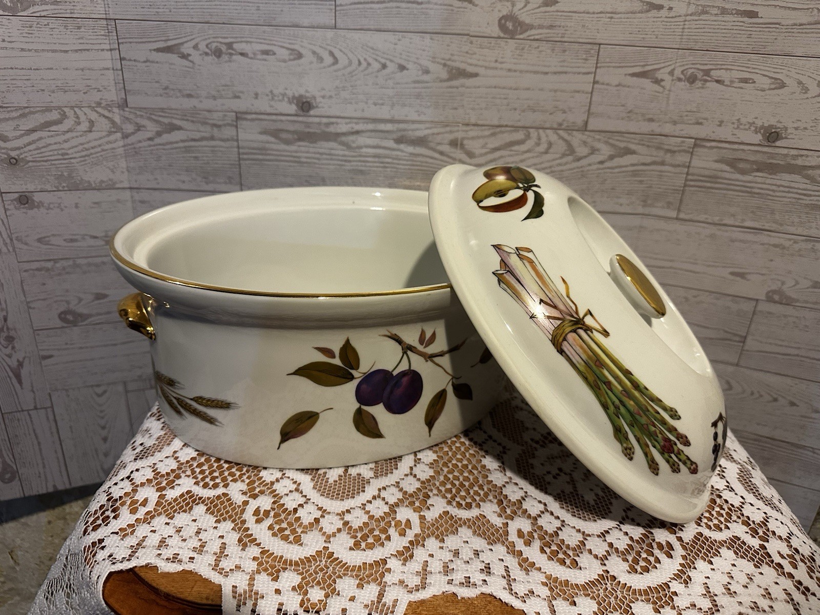 Set of three Royal Worcester Evesham Gold porcelain serving dishes with lids.