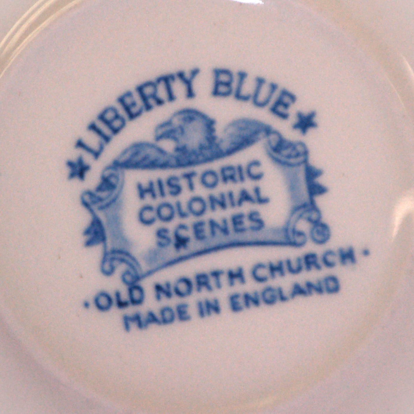 Liberty Blue Staffordshire Saucer Blue & White Floral Rim Scenes in Center