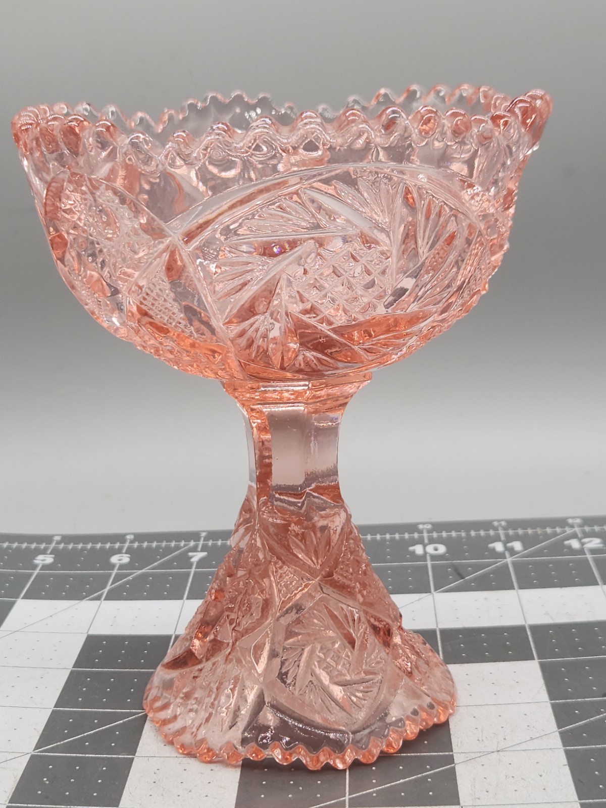 Aztec Heritage Carnival Glass Whirling Star Pedestal Compote Sawtooth Rim Pink