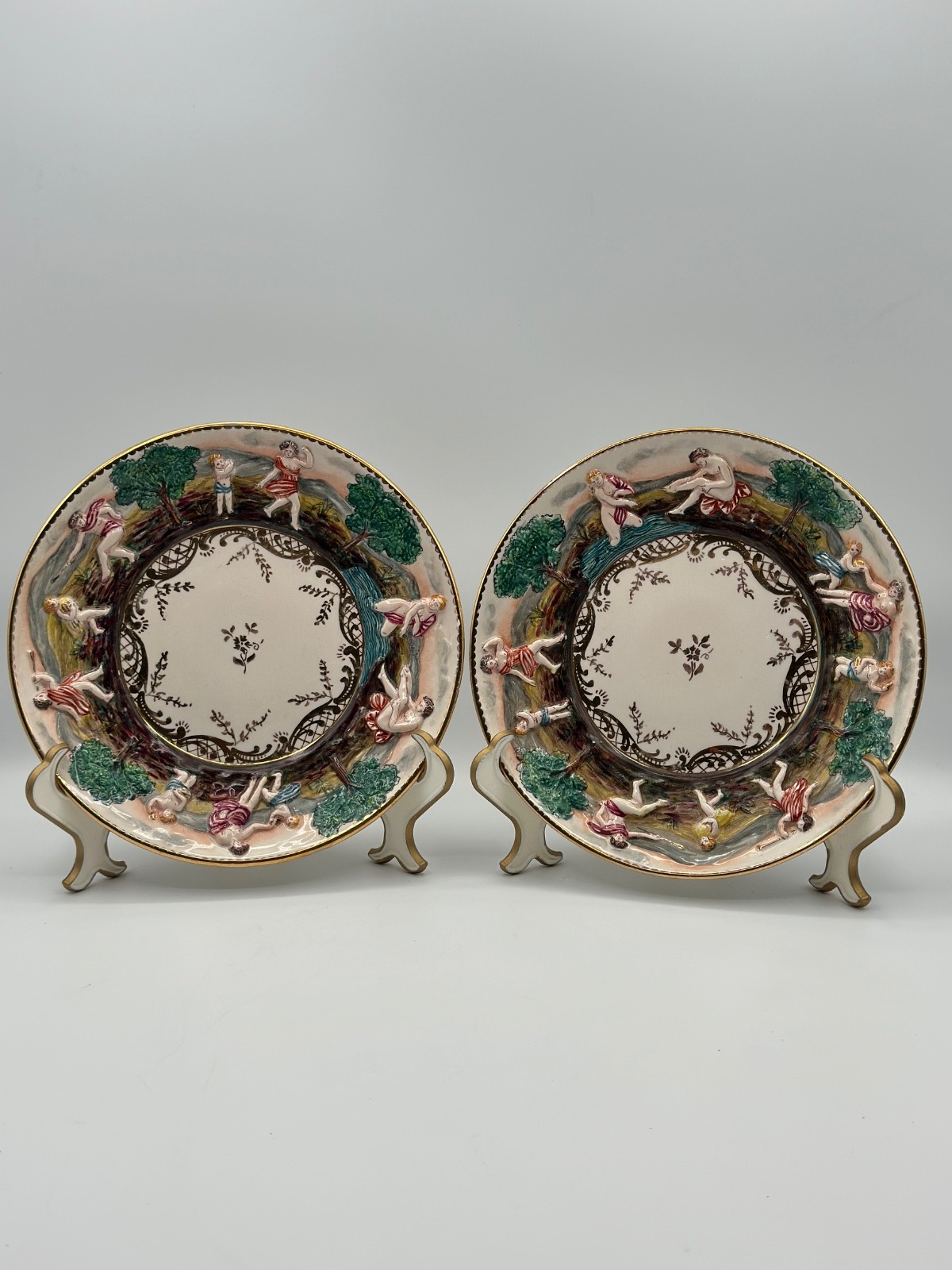 Pair Vintage Italian Capodimonte 7.5” Hand Painted Figural Relief Plates