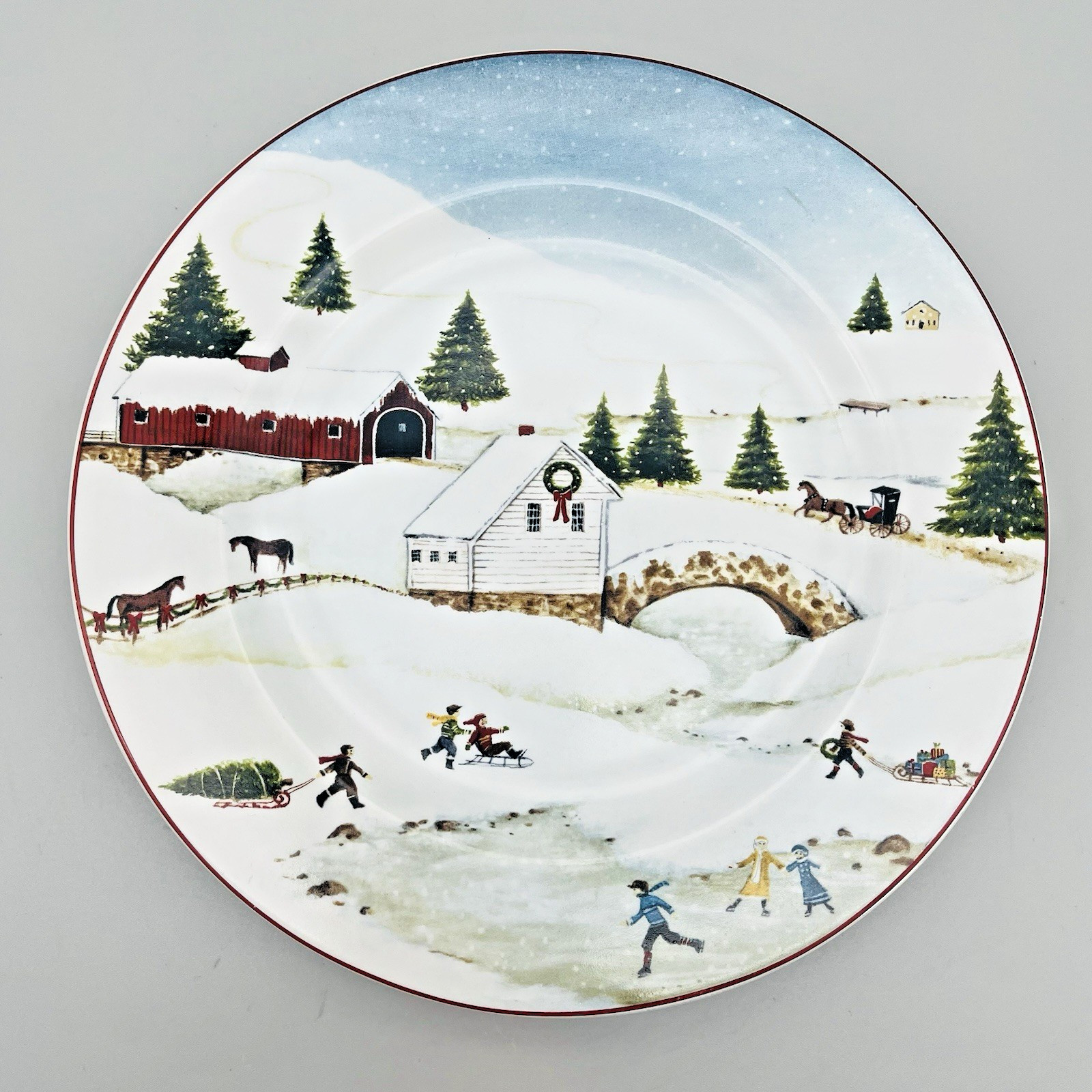 Christmas Valley Ice Skating Snowy Covered Bridge 8-1/4″ Plate Sakura Stoneware