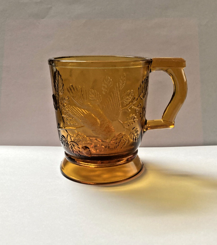 c 1880’s Amber mug No. 1203 “Robin in Tree” by Bryce Brothers