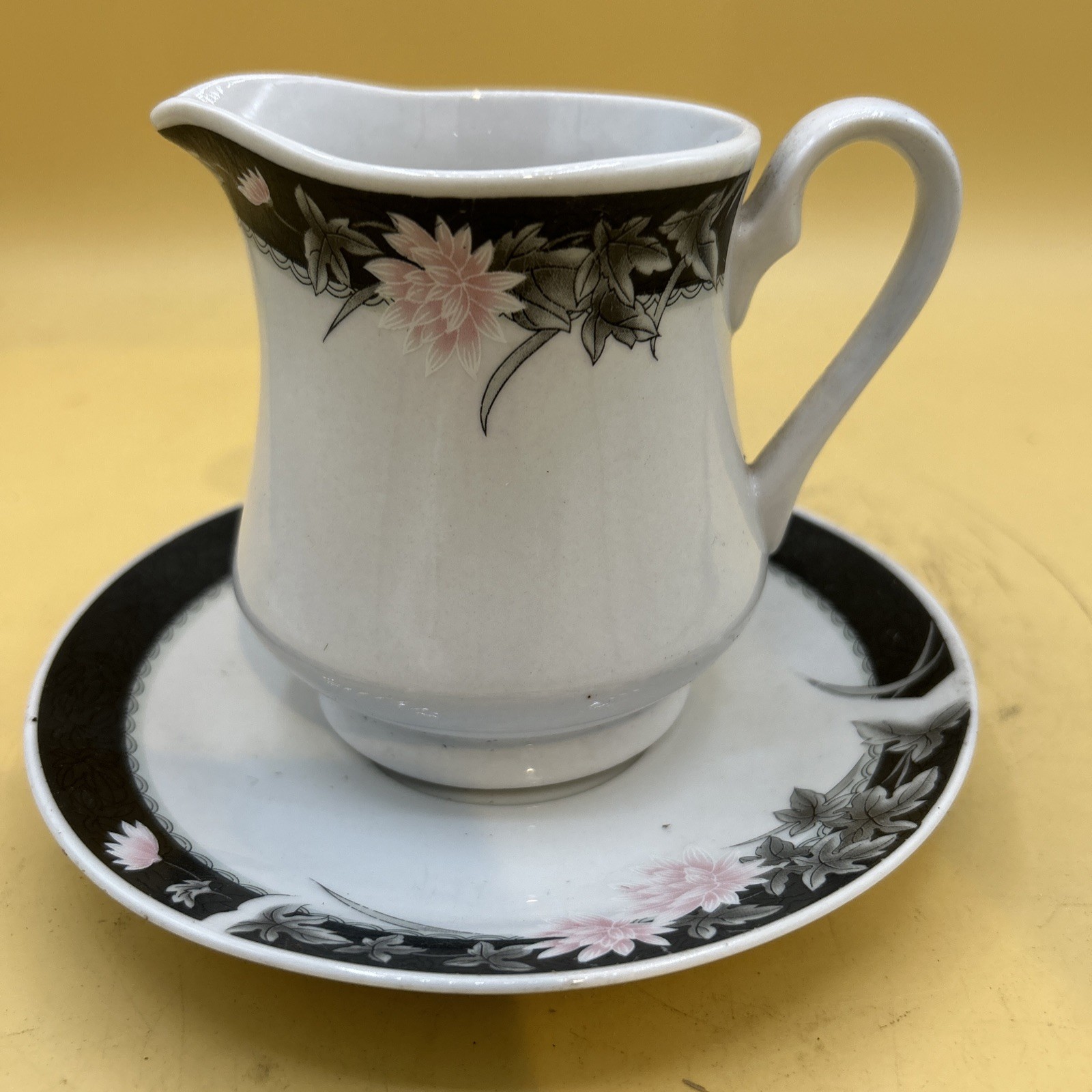 Fine China Ceramic Creamer And Saucer