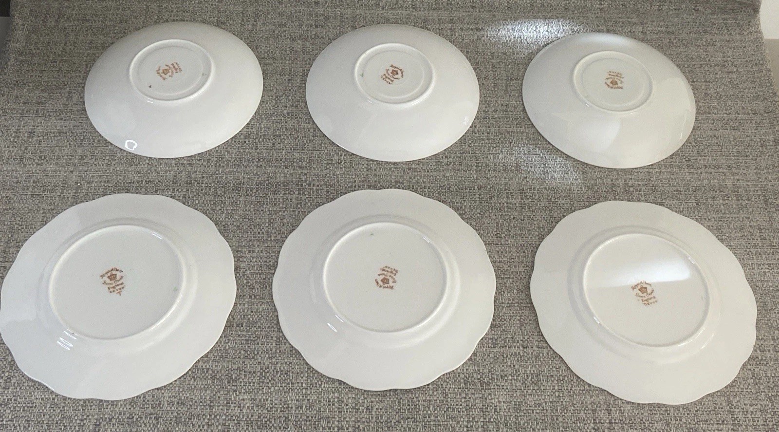 A matched set of 3 dessert plates + 3 saucers from Royal Albert Devon is absolut